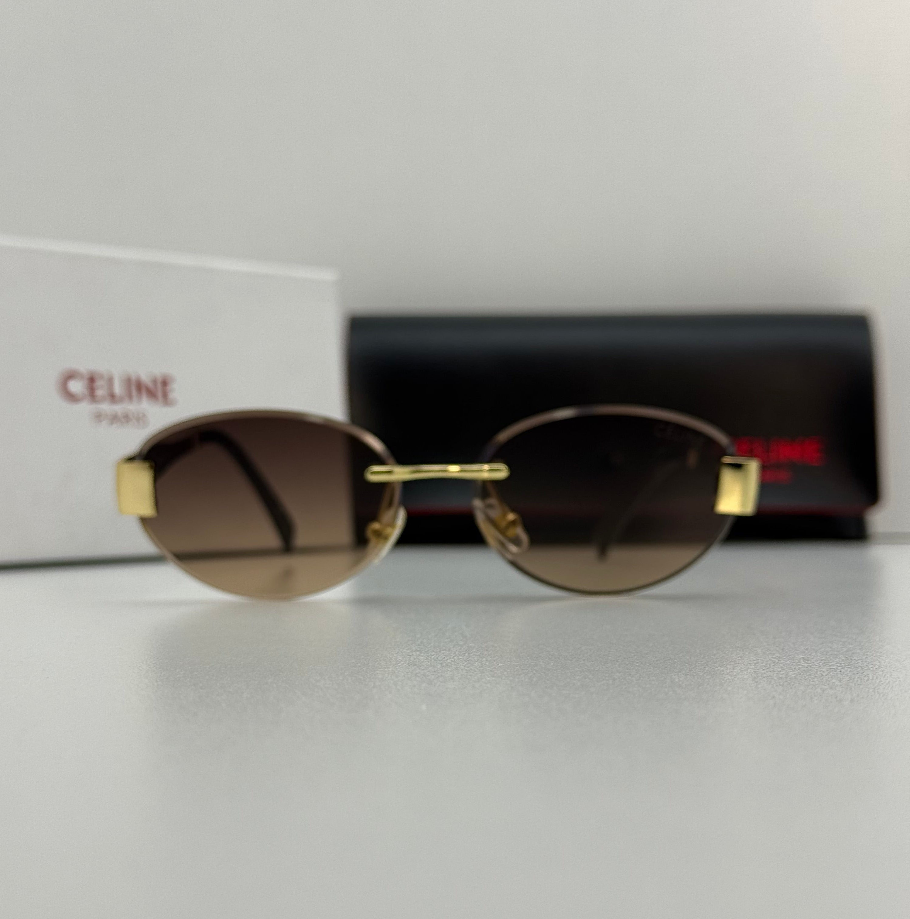 Celine Rimless Oval Sunglasses – Gold & Gradient Brown