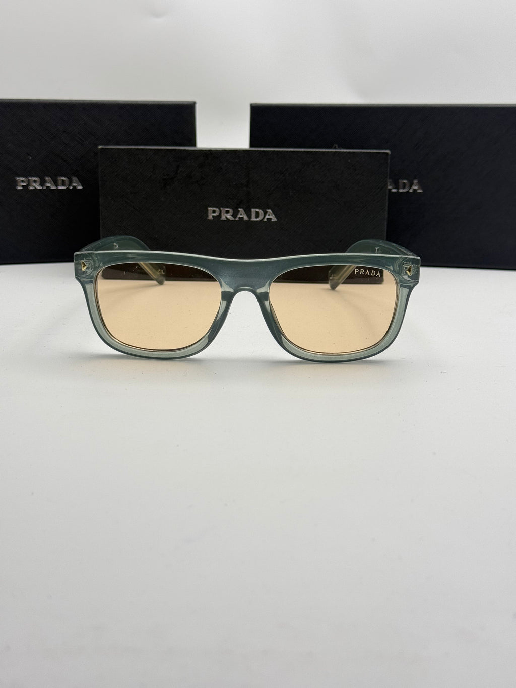 Prada Square Sunglasses – Sage Green Transparent Frame / Peach Amber Lenses