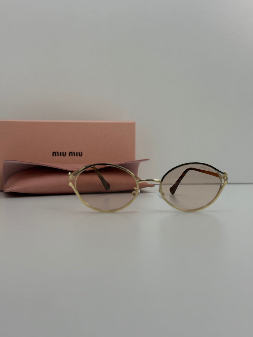 Miu Miu Oval Metal Sunglasses (Gold / Pink Gradient)