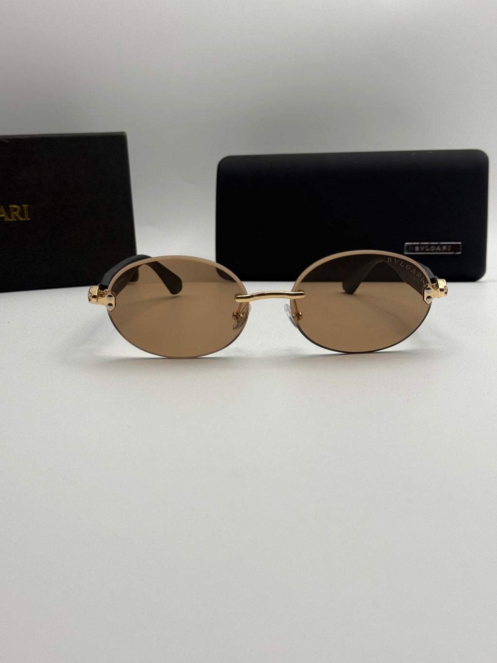 Bvlgari Rimless Oval Sunglasses – Gold & Brown