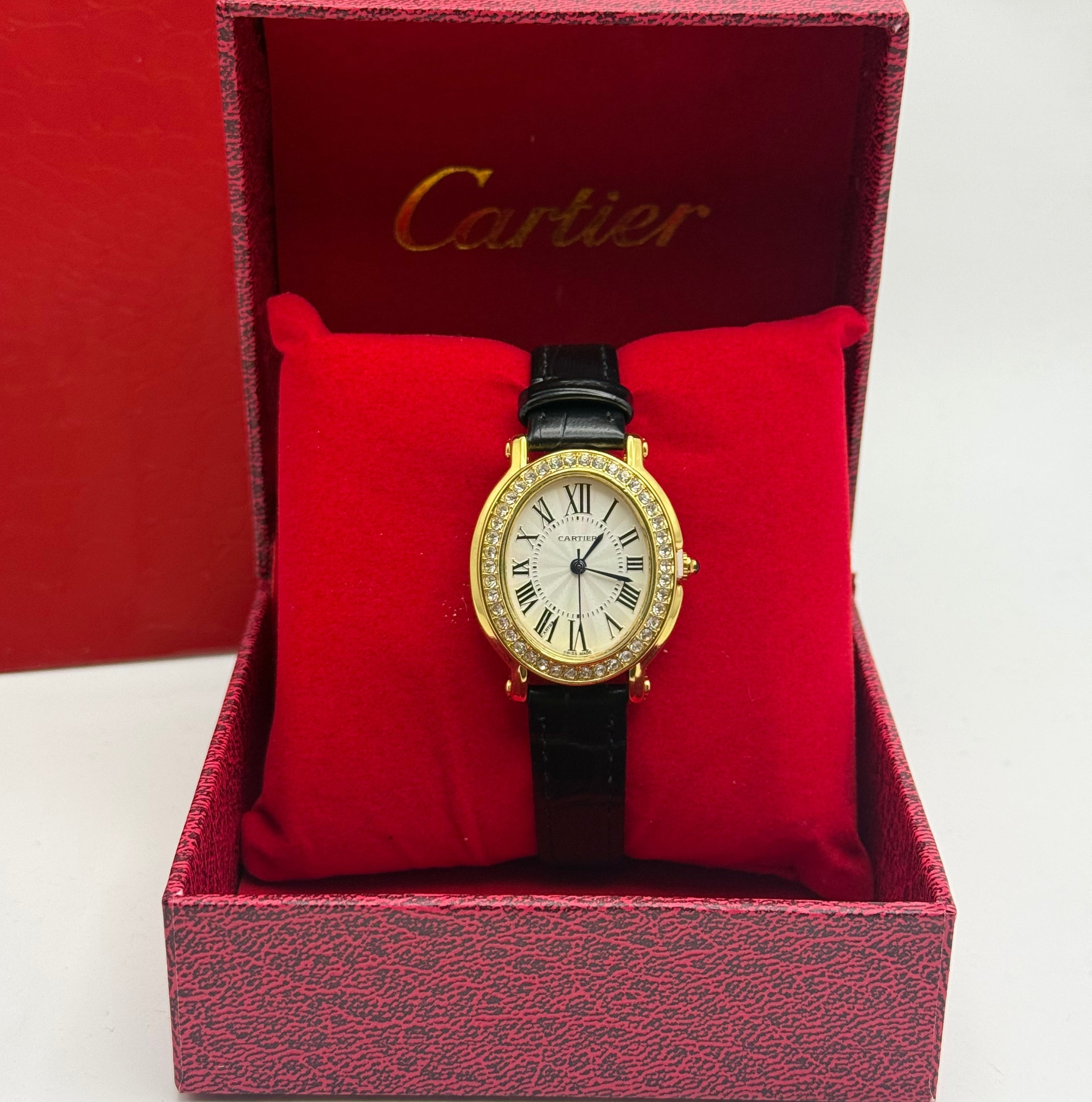 Cartier Oval Watch – Gold Diamond-Set Bezel / Black Leather Strap