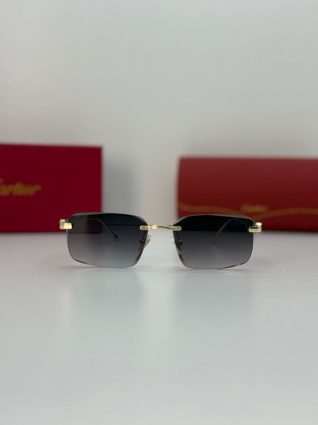Cartier Rimless Rectangular Gradient Sunglasses – Gold / Grey Gradient