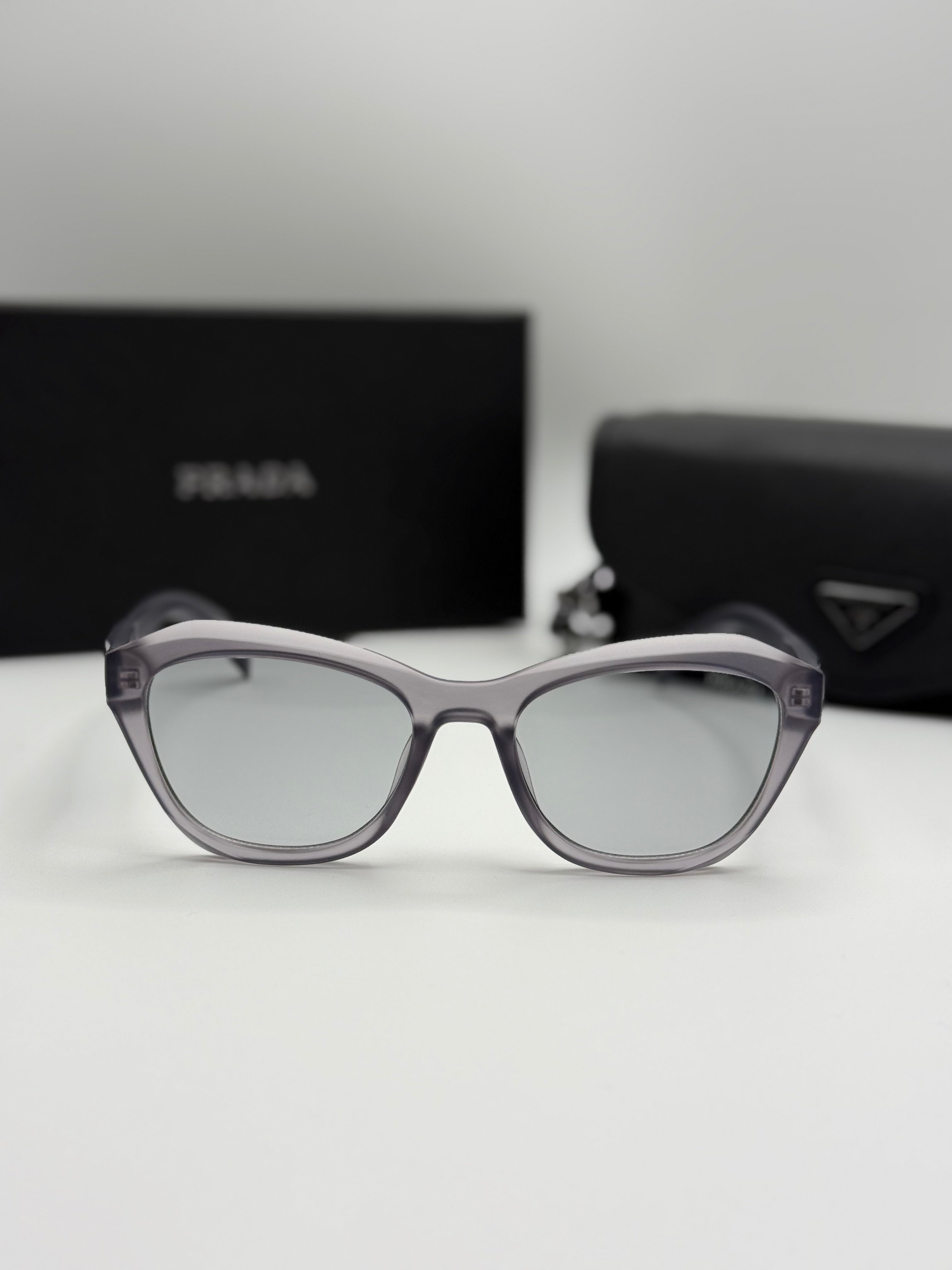 Prada Sunglasses – Grey Transparent Cat-Eye