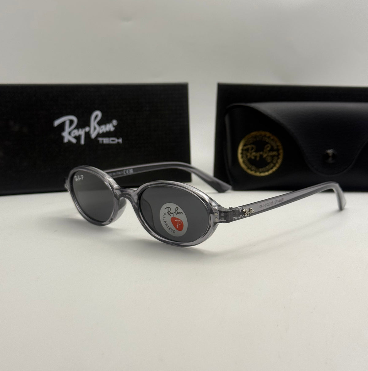Ray Ban Oval Polarized Sunglasses – Transparent Grey / Dark Grey