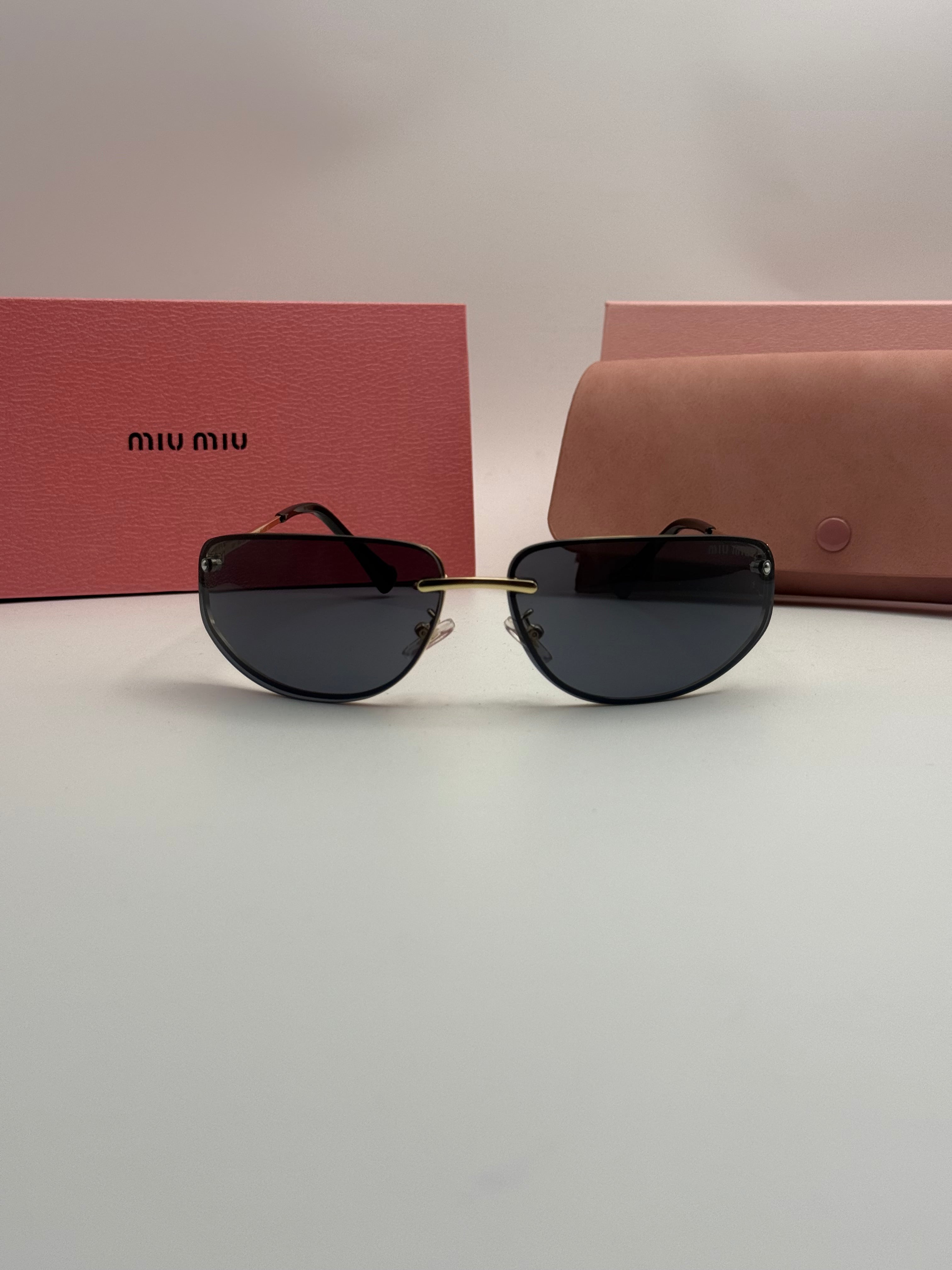 Miu Miu Rimless Sunglasses – Gold Frame / Dark Grey Lenses