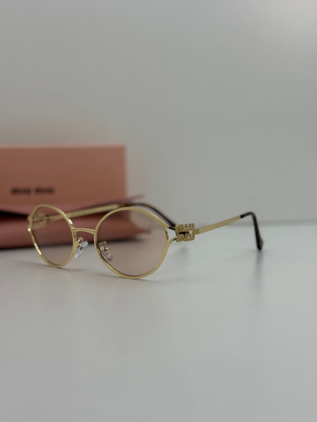 Miu Miu Oval Metal Sunglasses (Gold / Pink Gradient)