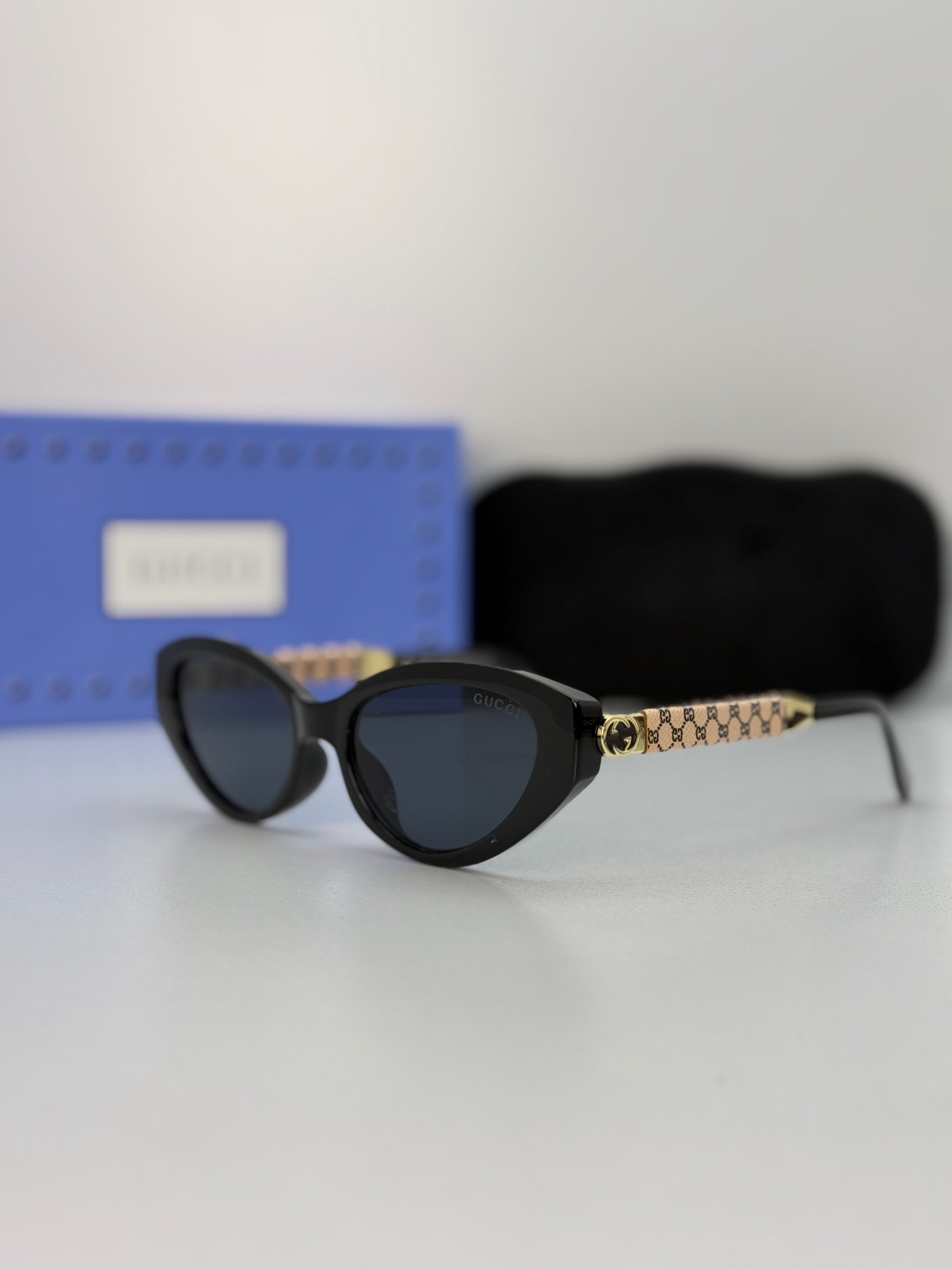 Gucci Cat-Eye Sunglasses — Black
