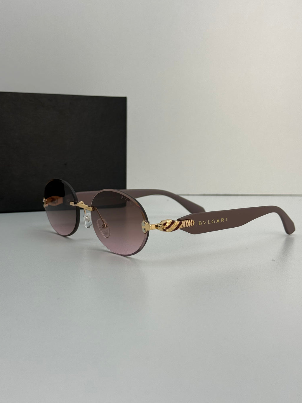 Bvlgari Rimless Oval Sunglasses – Brown Gradient & Gold