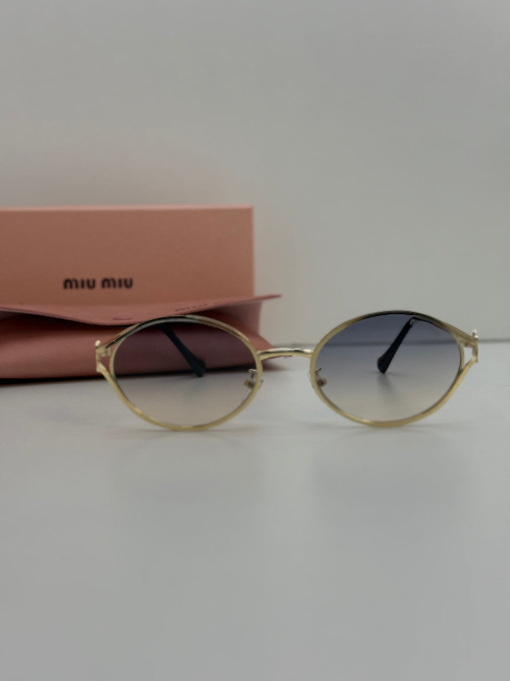 Miu Miu Oval Metal Sunglasses (Gold / Blue Grey Gradient )