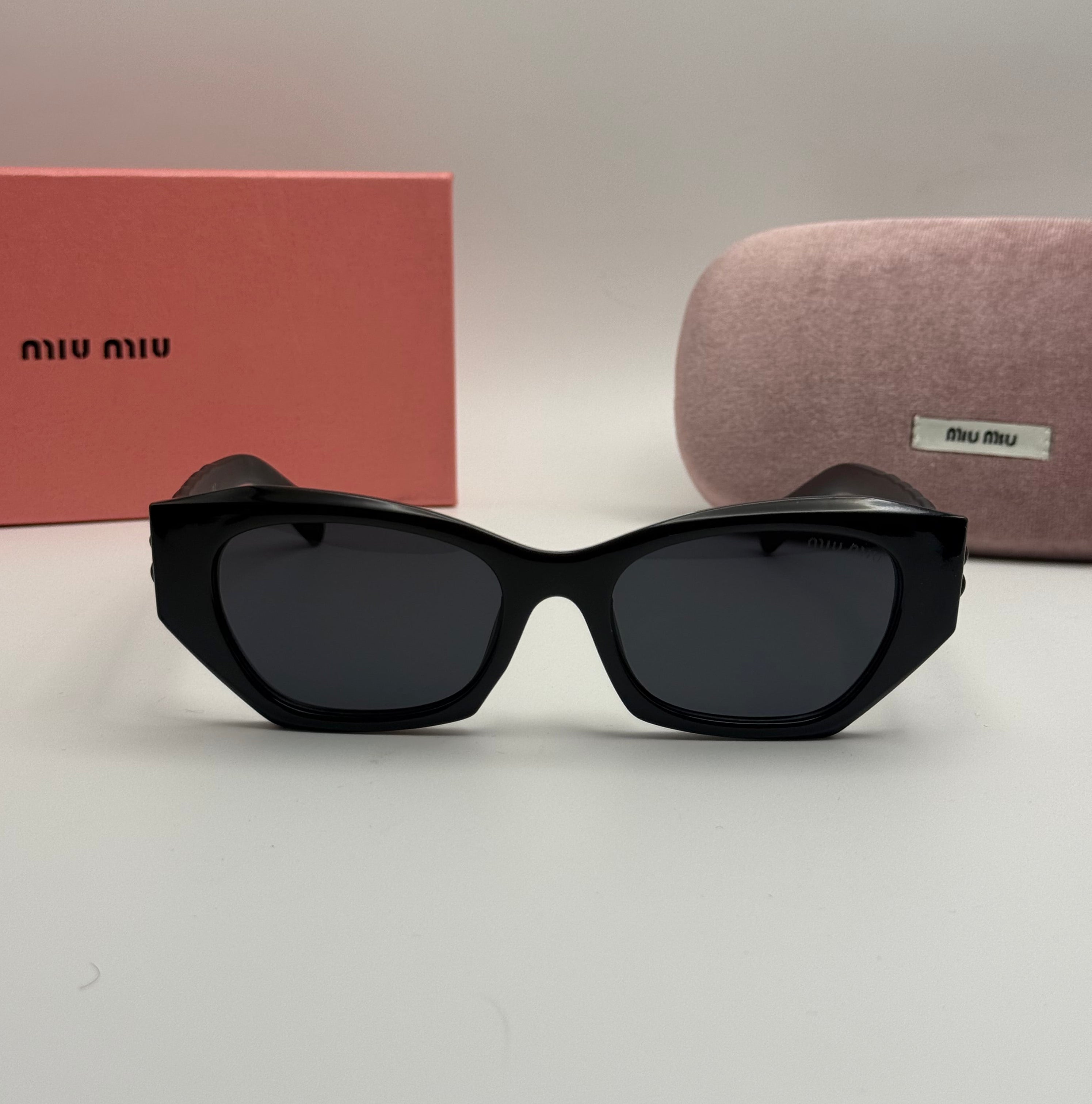 Miu Miu Cat-Eye Sunglasses – Black / Dark Grey Lenses