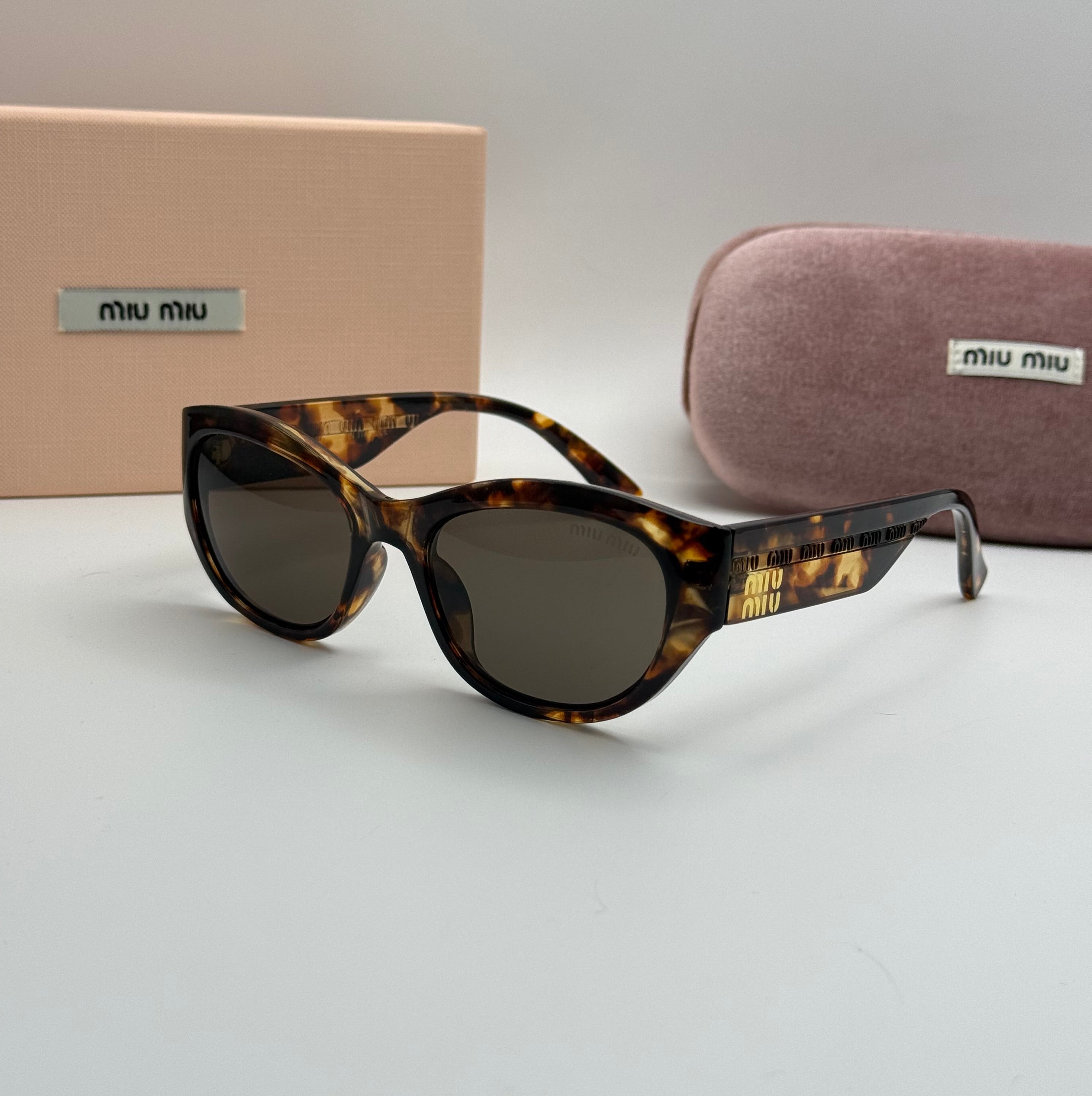 Miu Miu Cat-Eye Sunglasses – Tortoiseshell