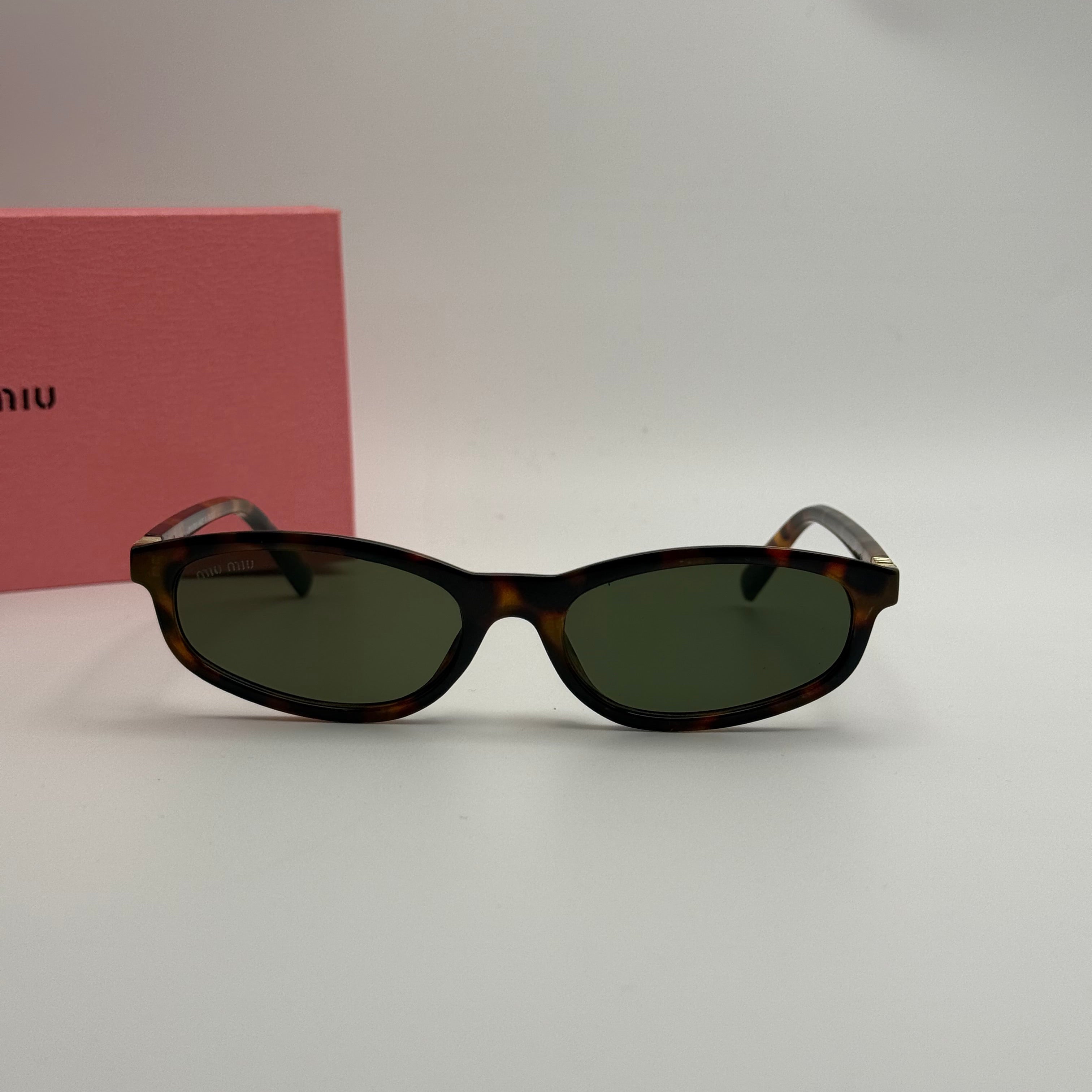 Miu Miu Oval Sunglasses – Tortoise Shell