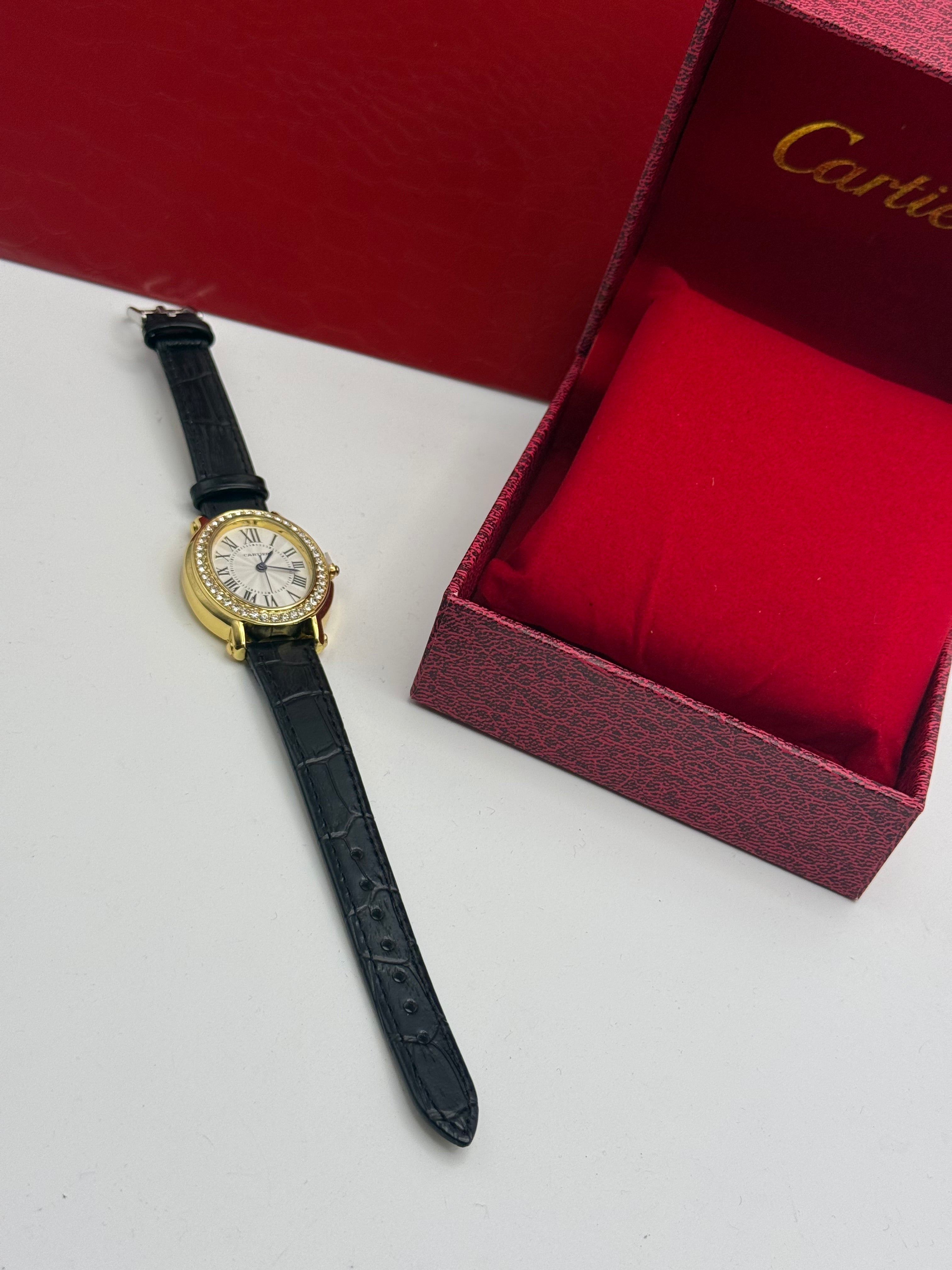 Cartier Oval Watch – Gold Diamond-Set Bezel / Black Leather Strap