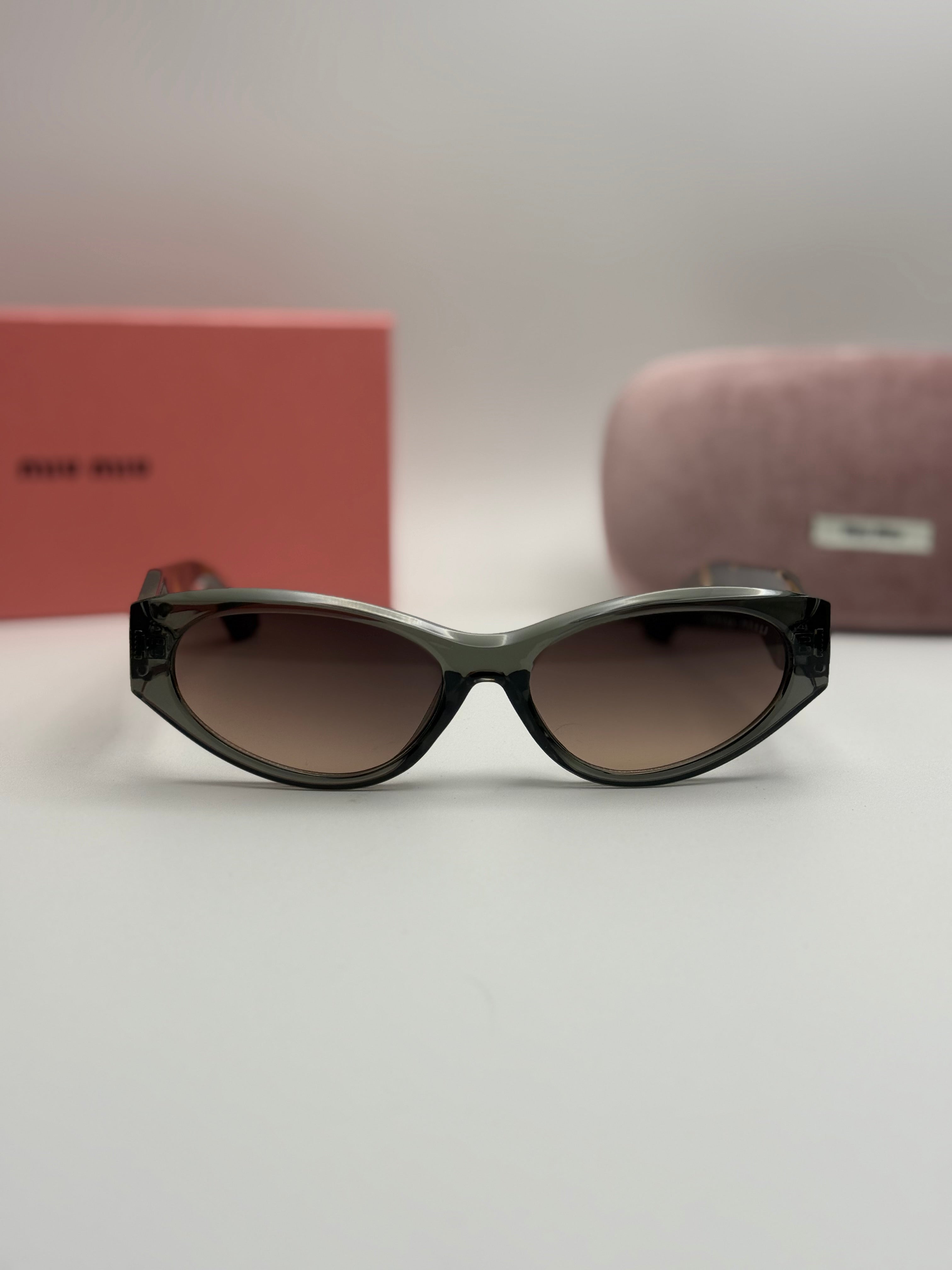 Miu Miu Oval Sunglasses – Grey Frame / Tortoise Temples / Brown Gradient Lenses