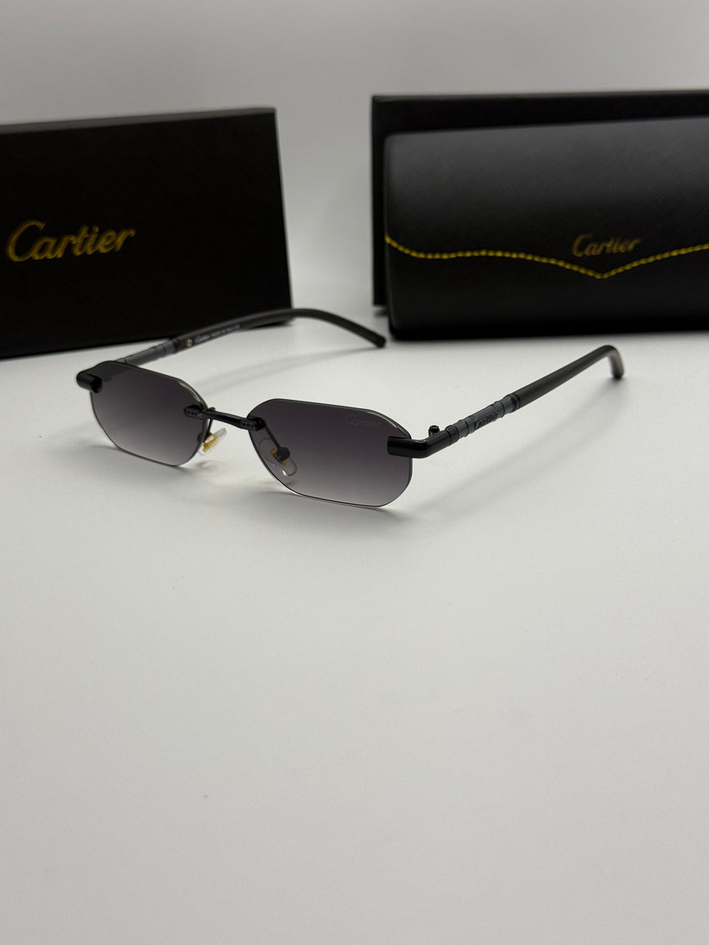 Cartier Rimless Rectangular Sunglasses – All Black