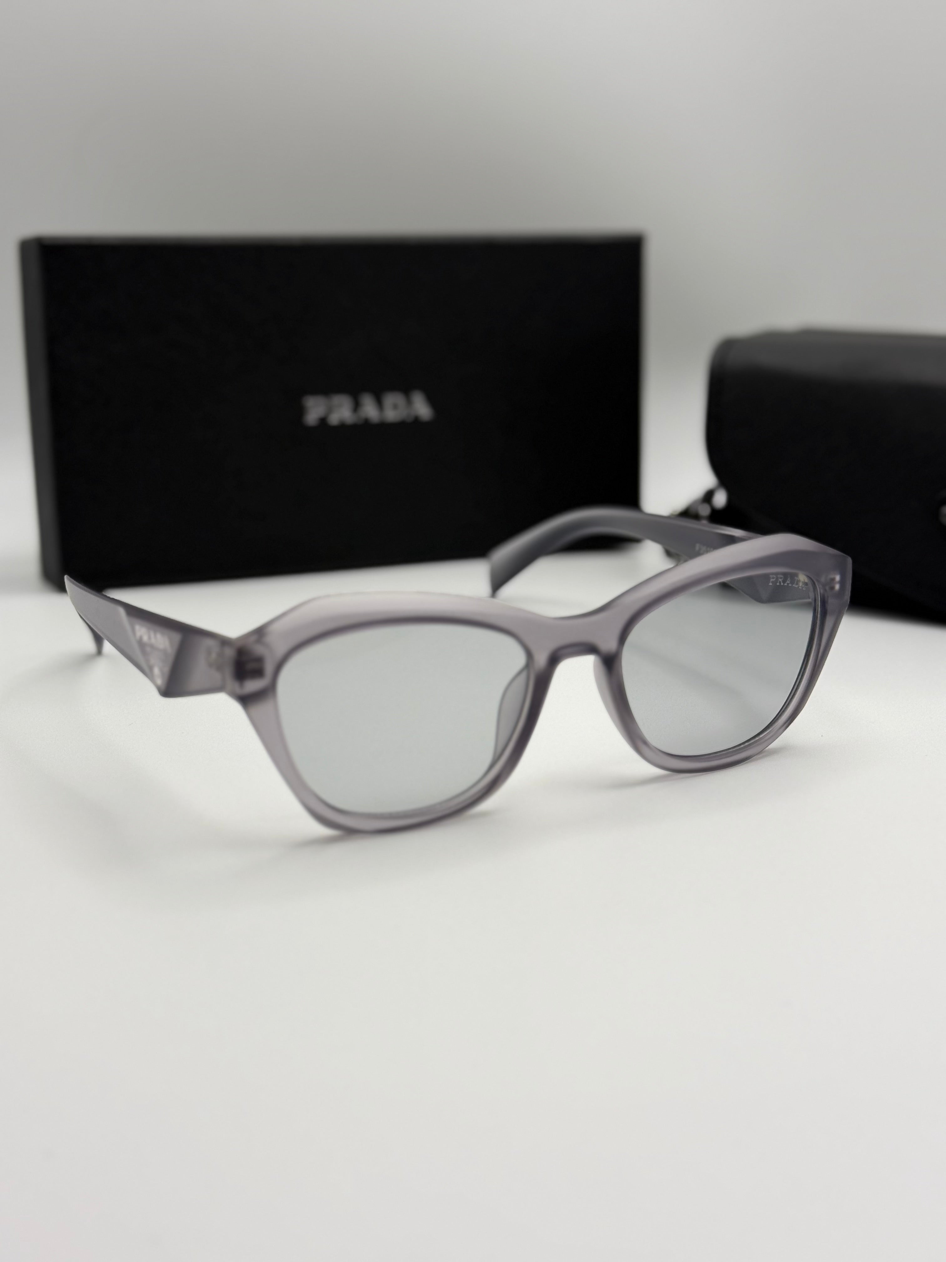 Prada Sunglasses – Grey Transparent Cat-Eye