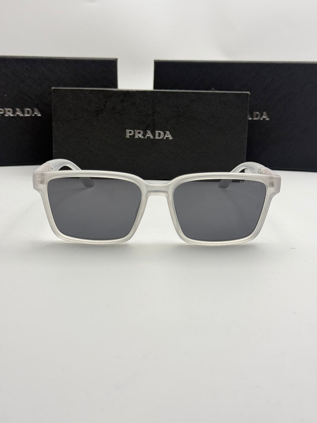 Prada Linea Rossa Square Sunglasses – Crystal Clear Frame / Dark Grey Lenses