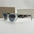 Christian Dior Cat-Eye Sunglasses – Transparent Green / Camouflage
