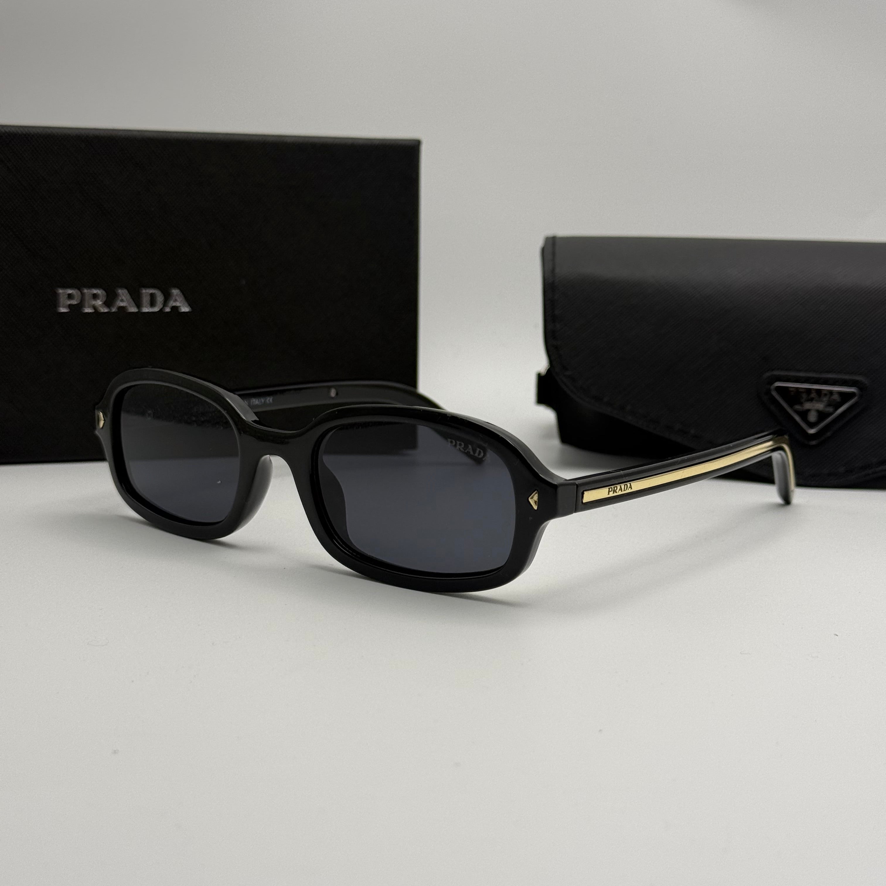 Prada Sunglasses – Black Frame / Dark Lens