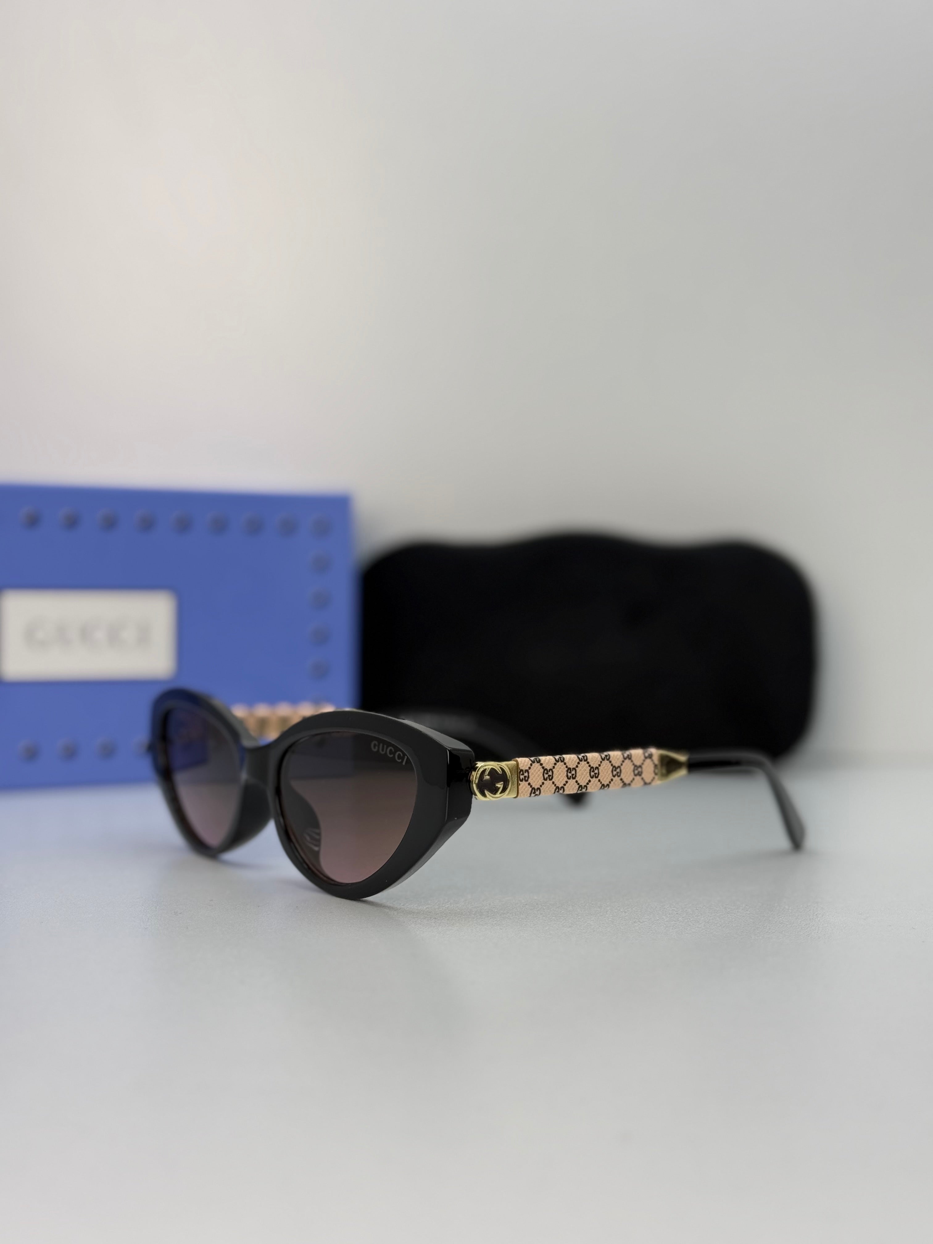 Gucci Cat-Eye Sunglasses — Black / Brown Gradient