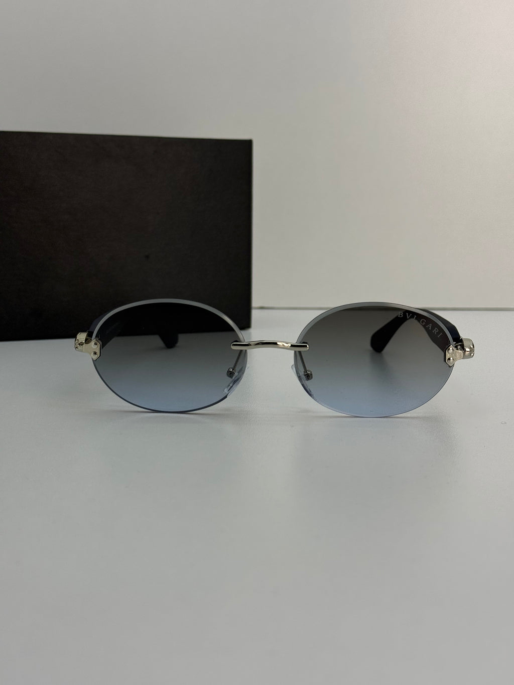 Bvlgari Rimless Oval Sunglasses