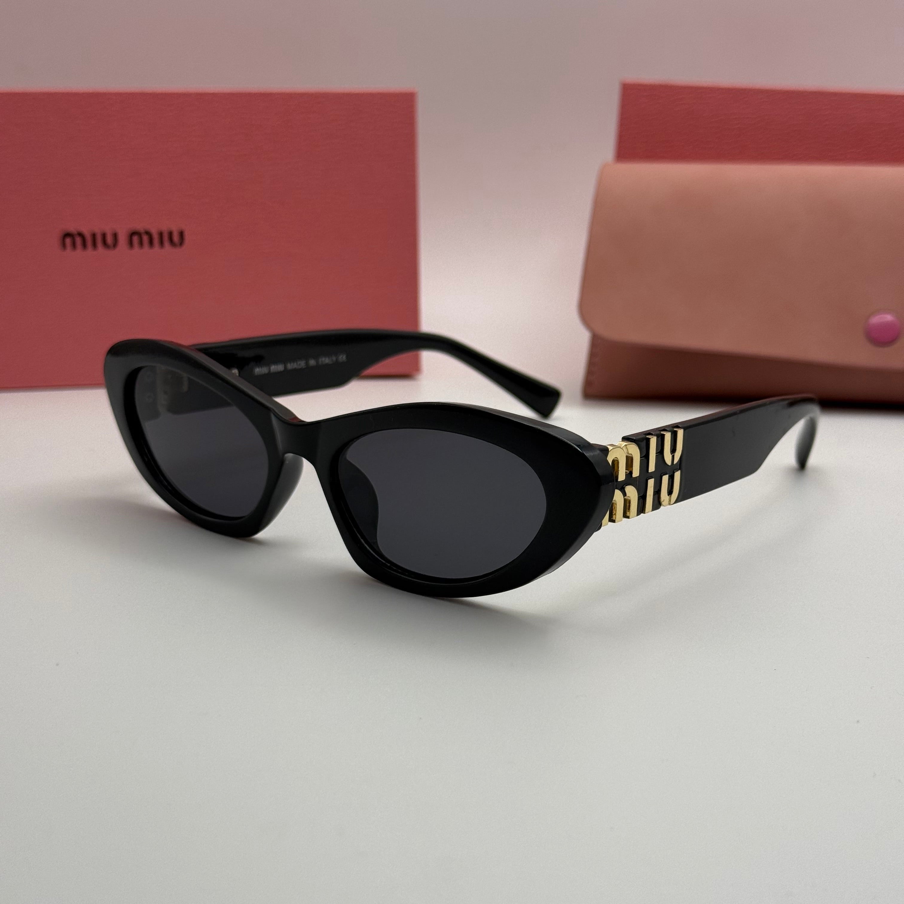 Miu Miu Oval Cat-Eye Sunglasses
