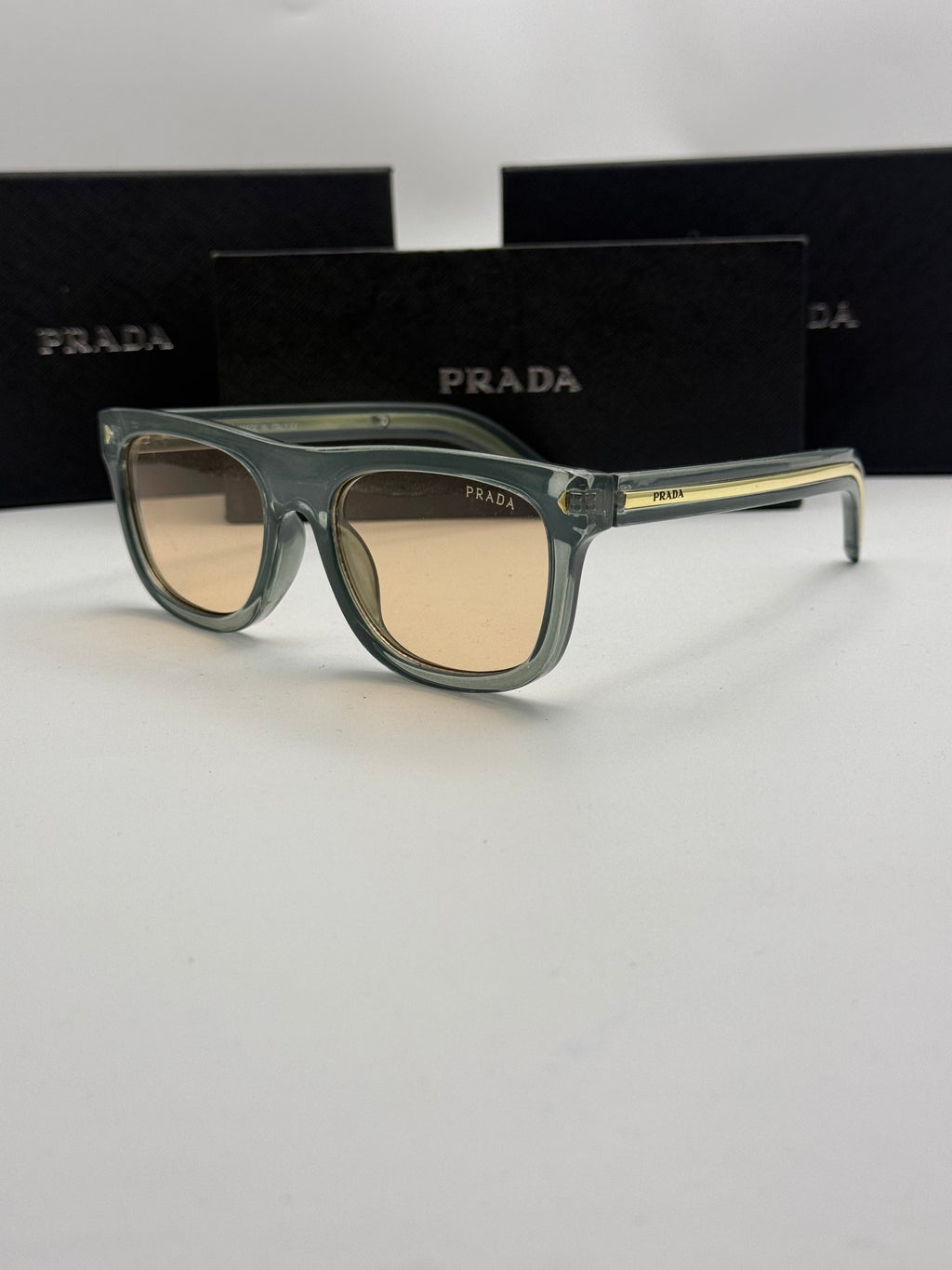 Prada Square Sunglasses – Sage Green Transparent Frame / Peach Amber Lenses