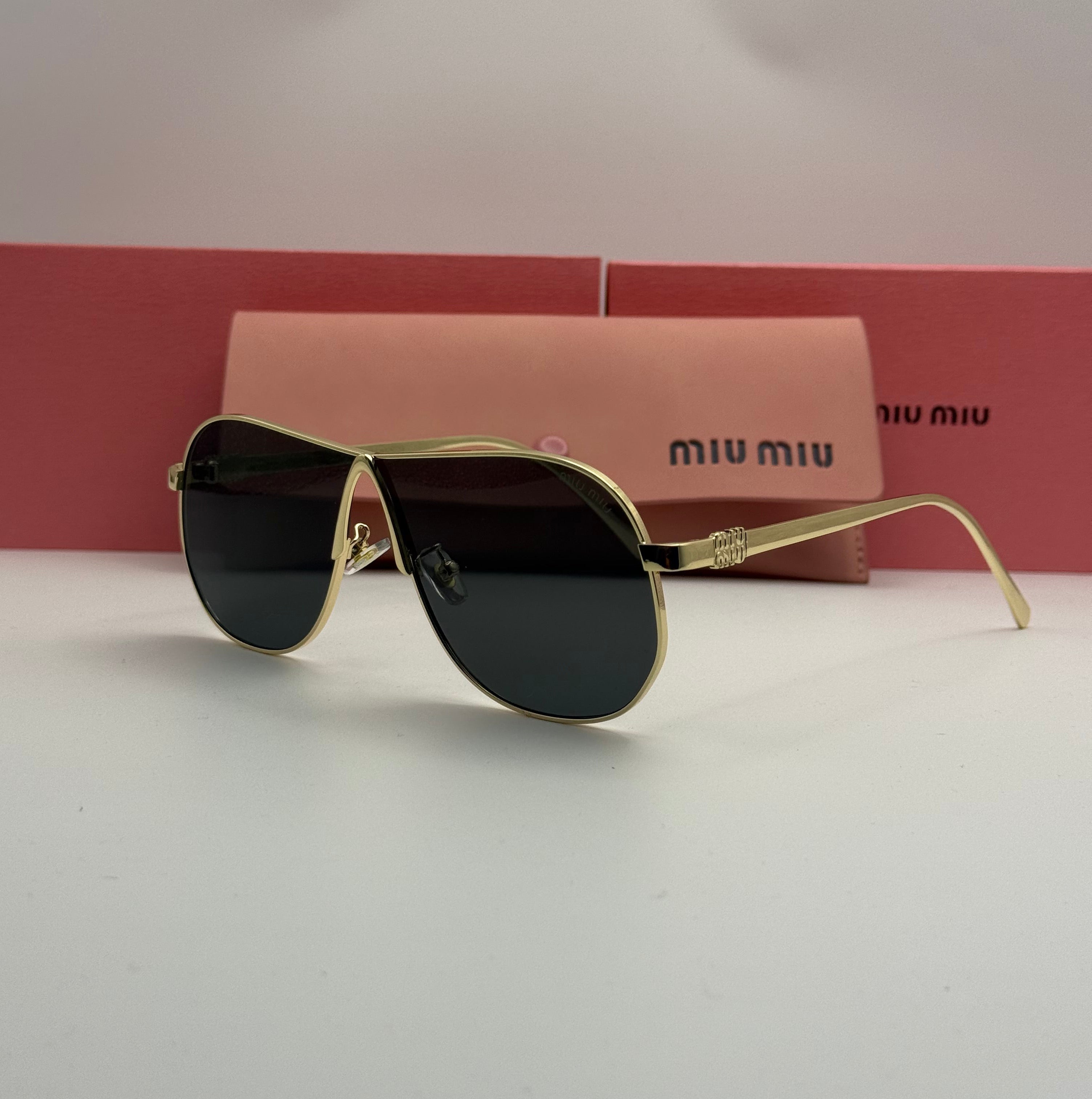 Miu Miu Aviator Sunglasses – Gold Frame / Dark Black Lenses