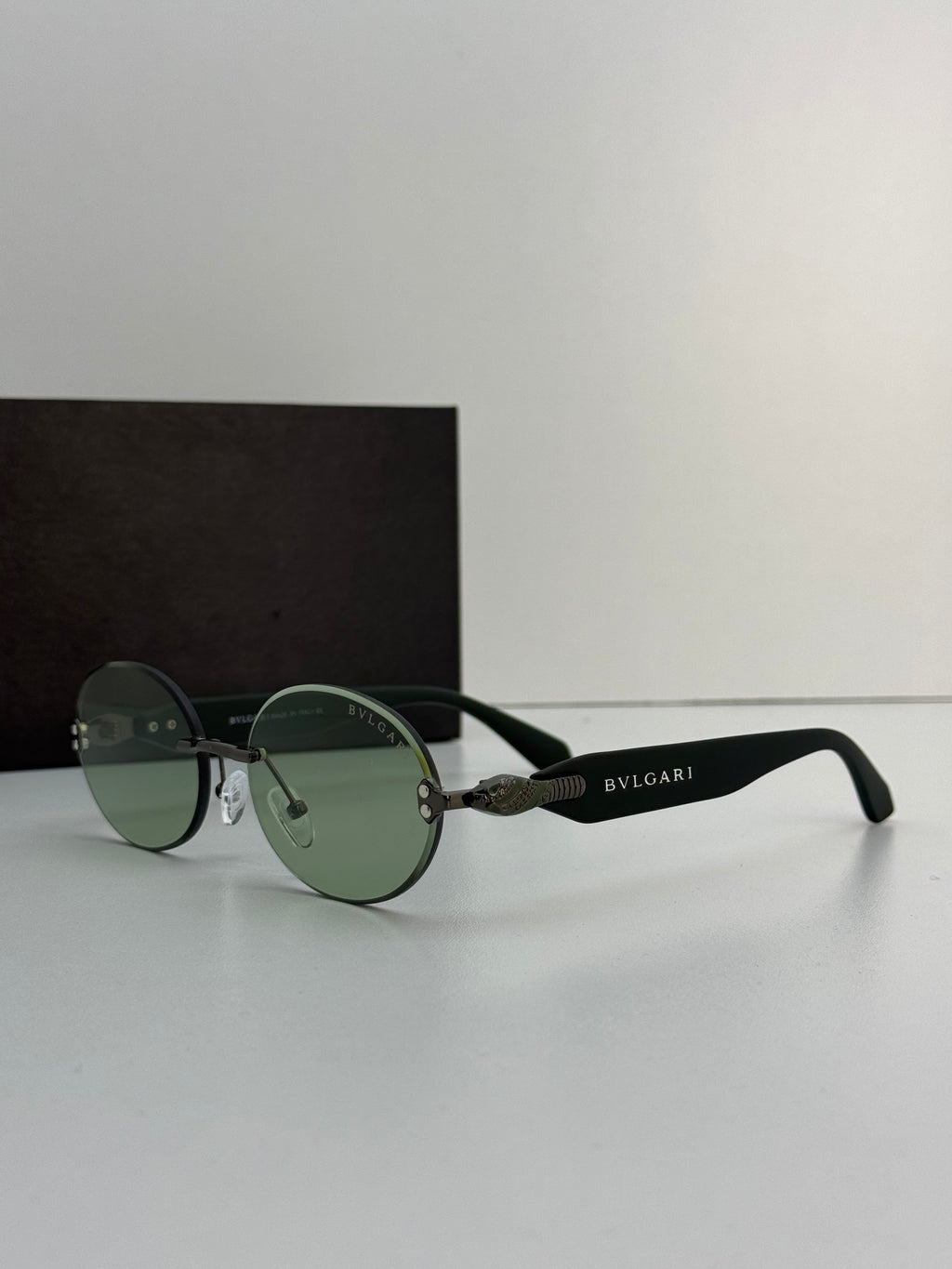 BVLGARI – Green lenses with black temples and gunmetal frame