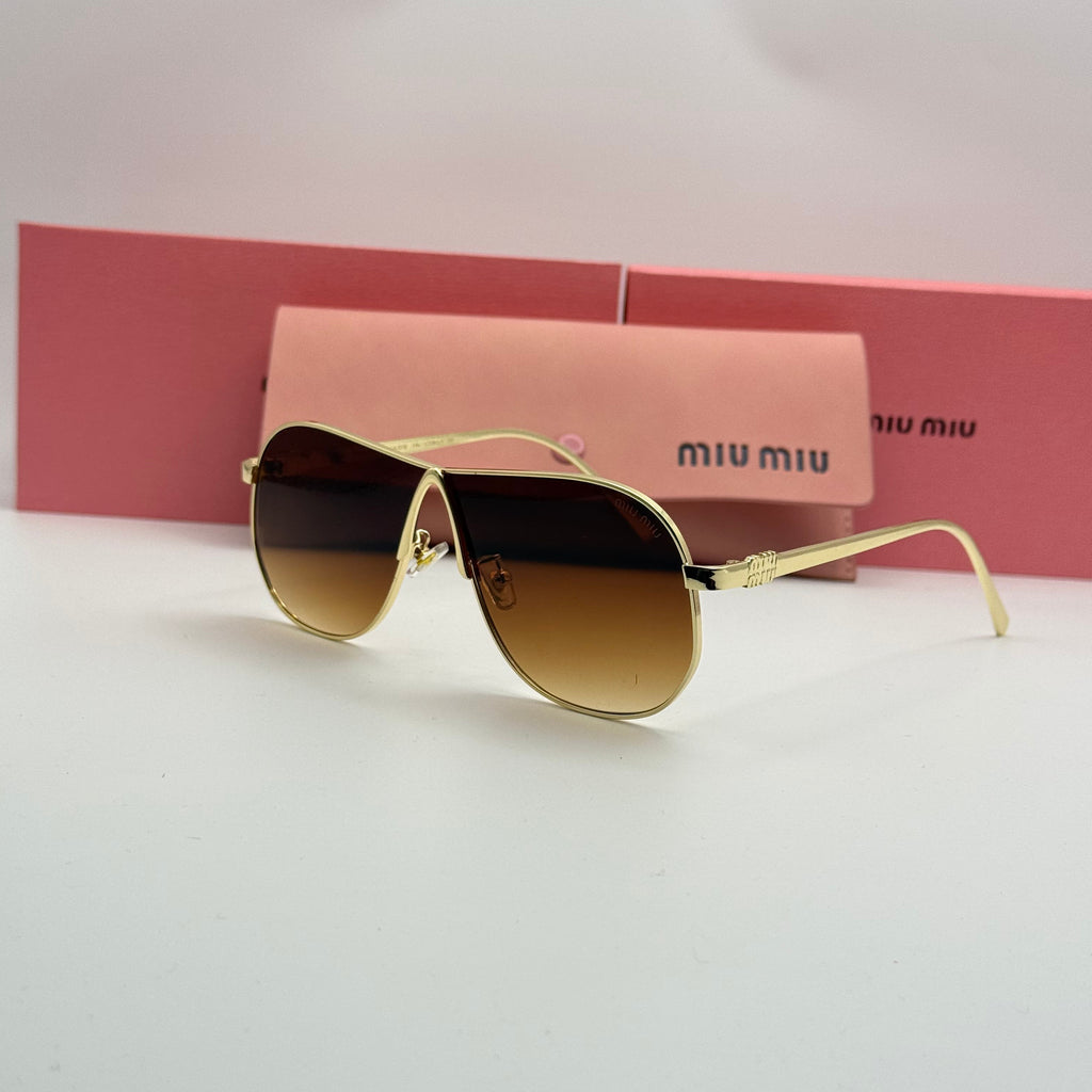 Miu Miu Aviator Sunglasses – Gold Frame / Amber Brown Gradient Lenses