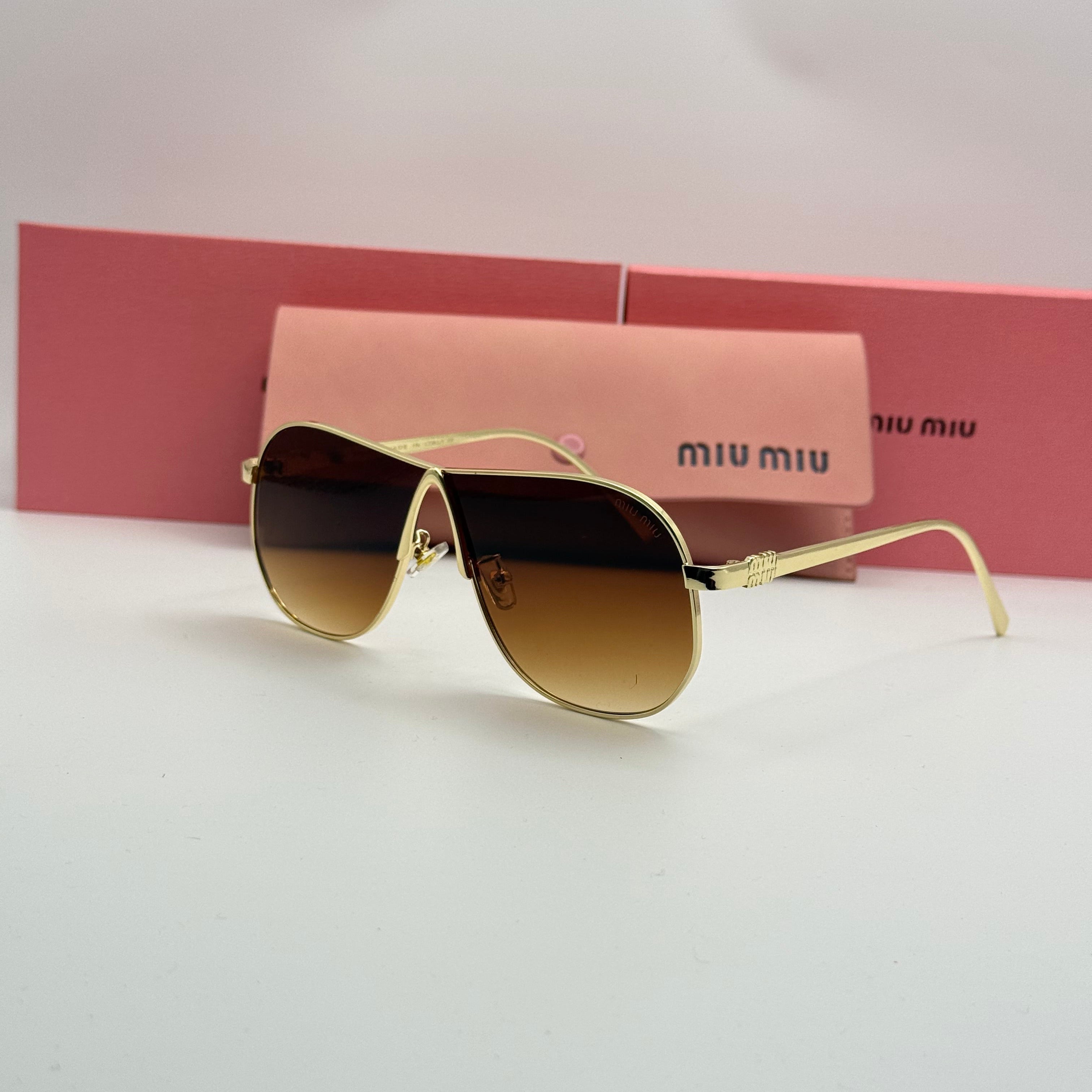 Miu Miu Aviator Sunglasses – Gold Frame / Amber Brown Gradient Lenses