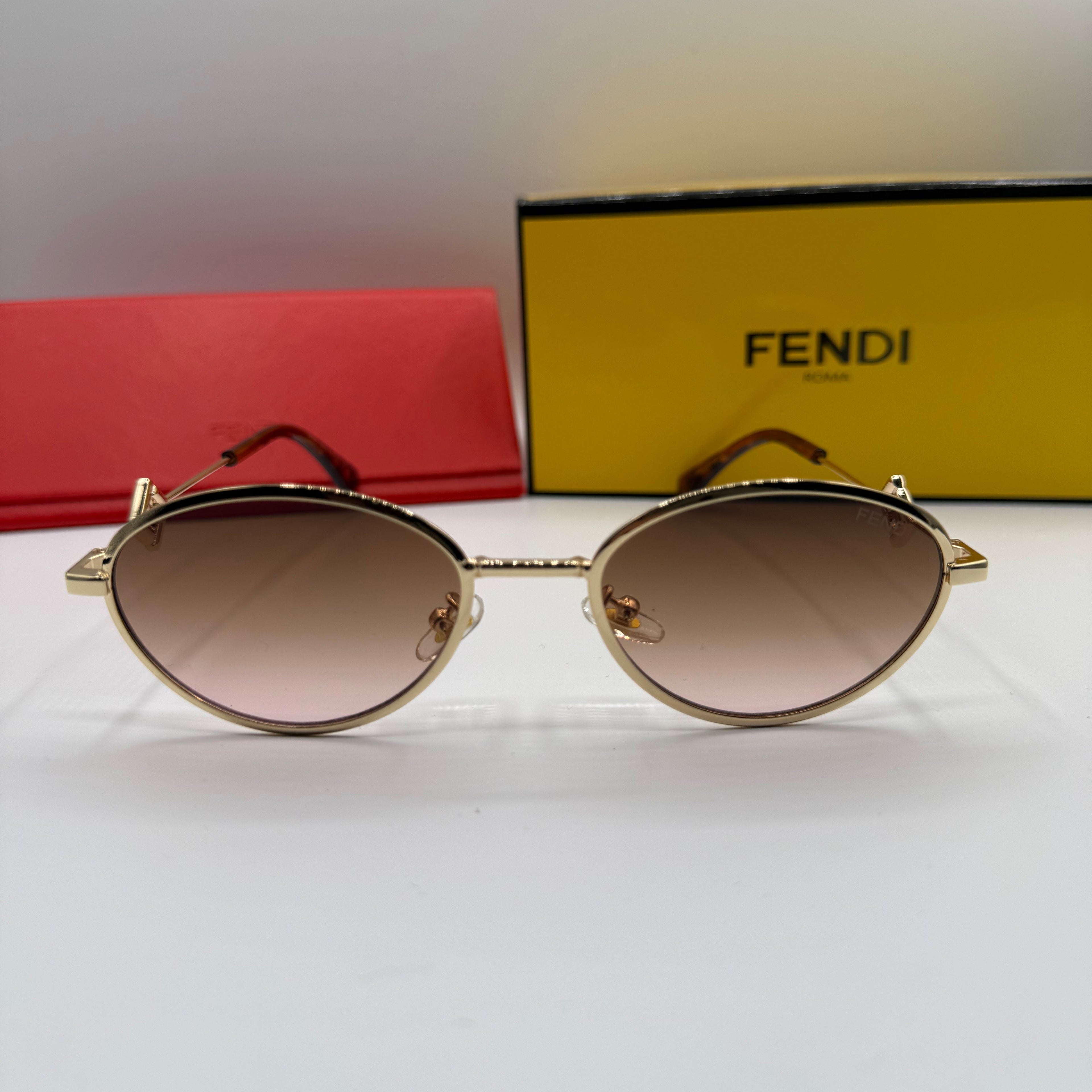 Fendi Round Sunglasses – Gold Frame & Gradient Brown Lenses