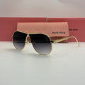 Miu Miu Aviator Sunglasses – Gold Frame / Grey Smoke Gradient Lenses