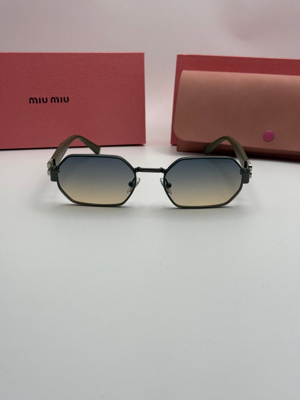 Miu Miu Sunglasses – Dark Frame Gradient Lenses