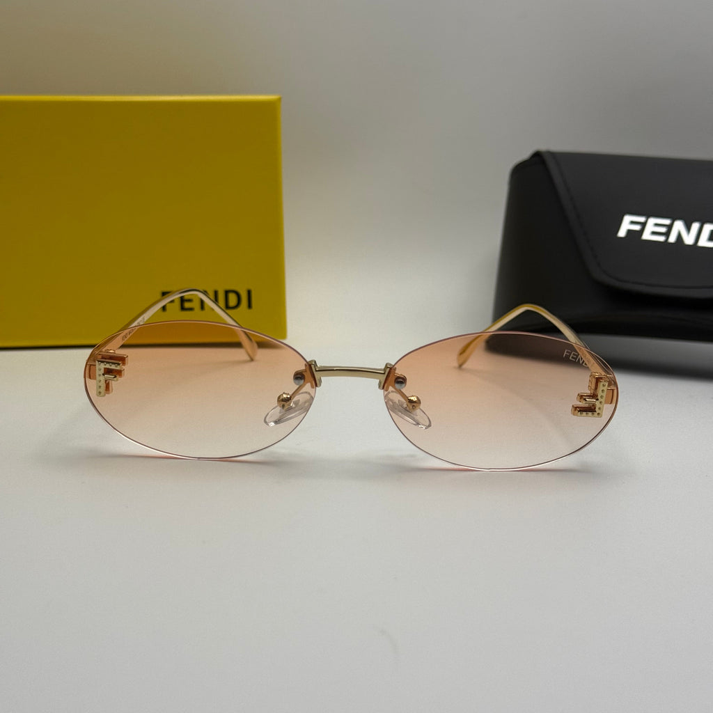 Fendi Rimless Oval Sunglasses – Gold / Peach Gradient