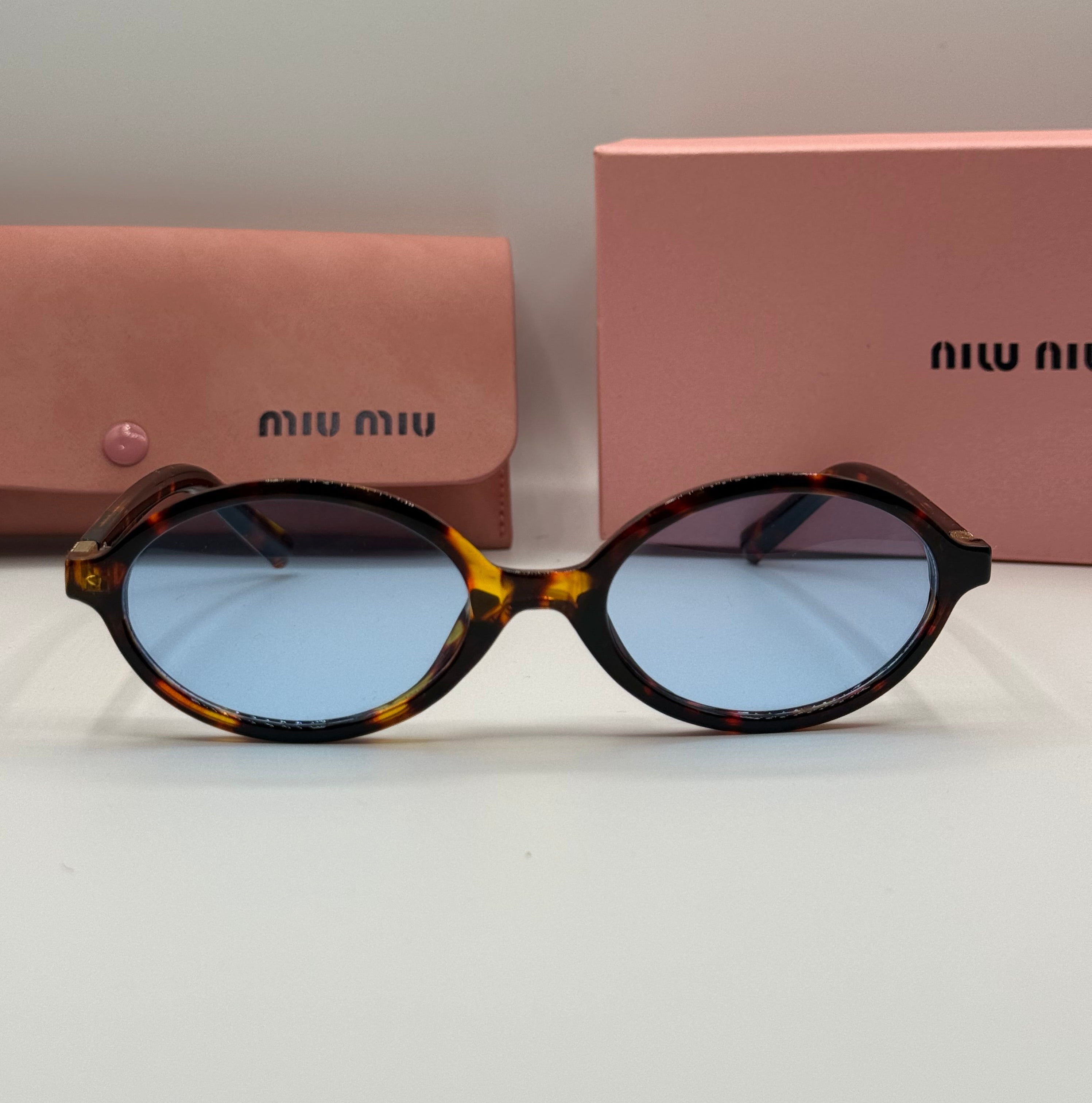 Miu Miu Oval Sunglasses – Tortoise / Blue