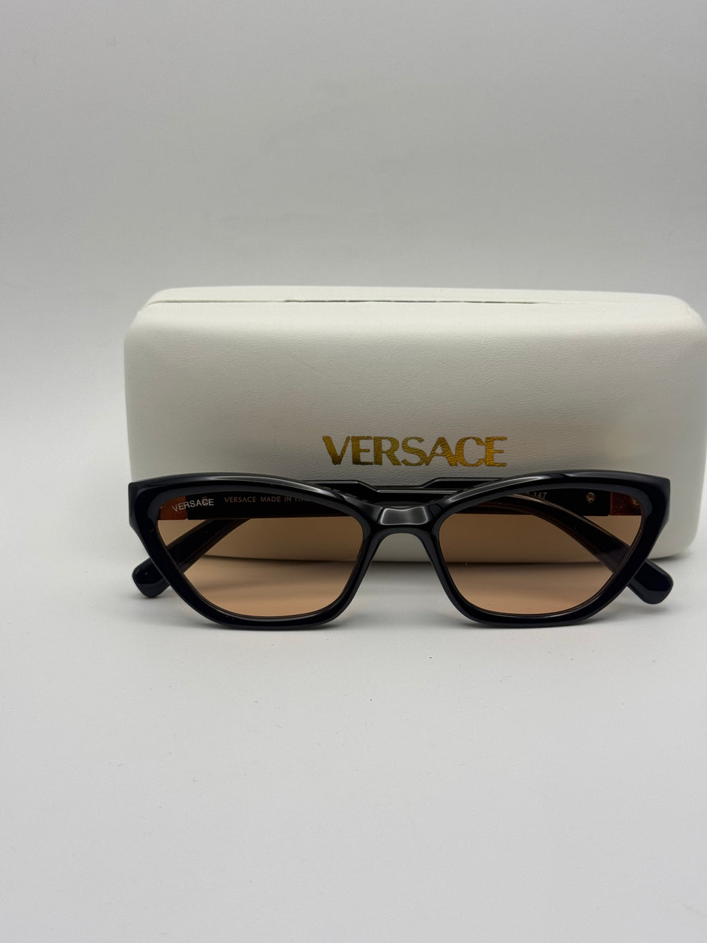 Versace Cat-Eye Sunglasses – Black / Amber Lenses