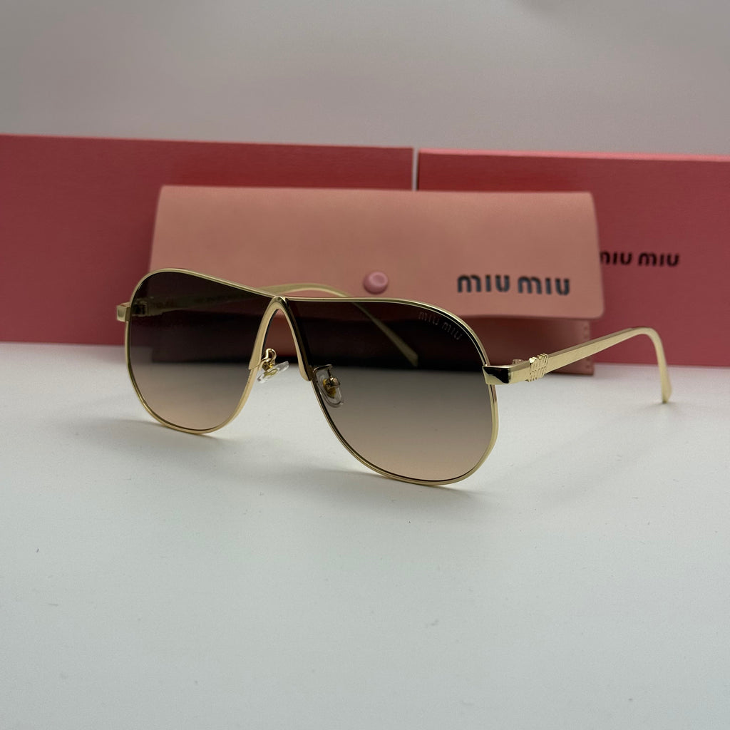 Miu Miu Aviator Sunglasses – Gold Frame / Brown Gradient Lenses