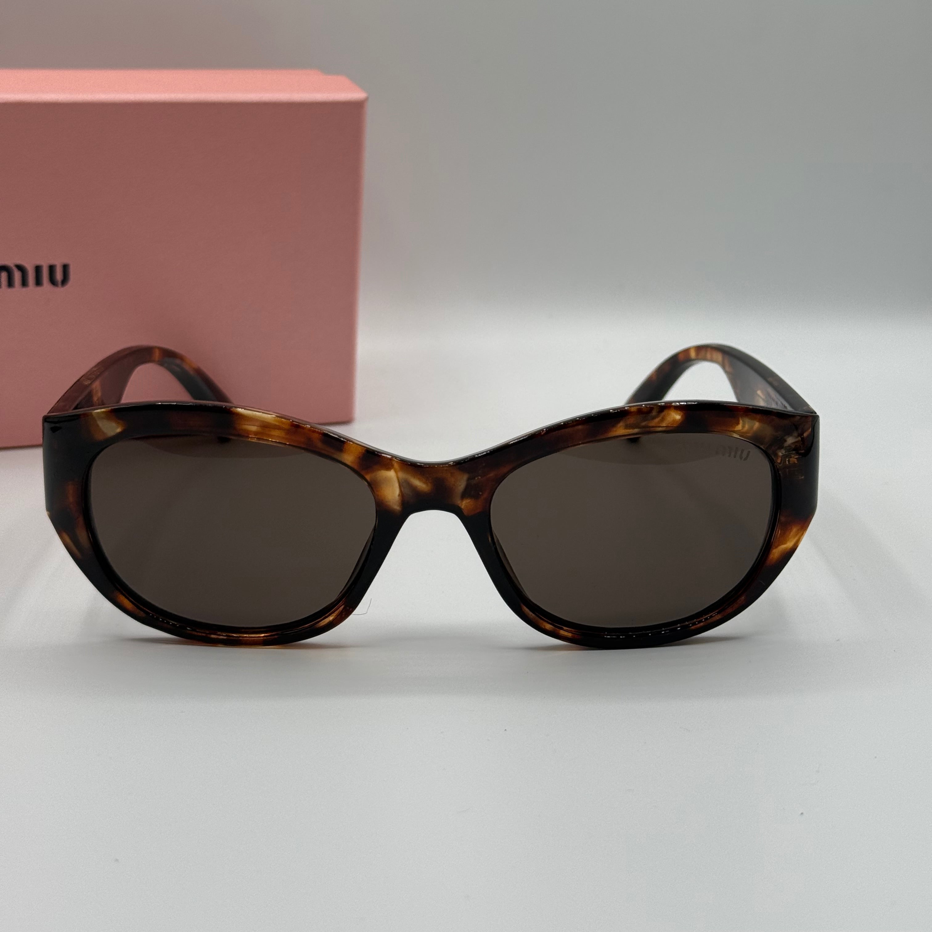 Miu Miu Cat-Eye Sunglasses – Tortoiseshell