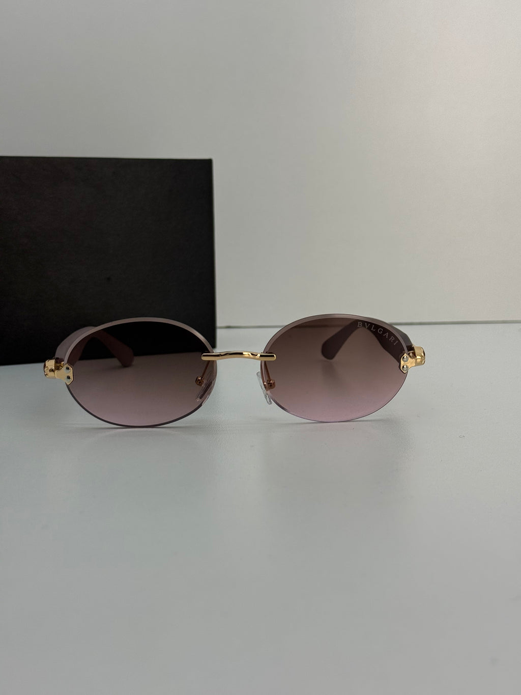 Bvlgari Rimless Oval Sunglasses – Brown Gradient & Gold