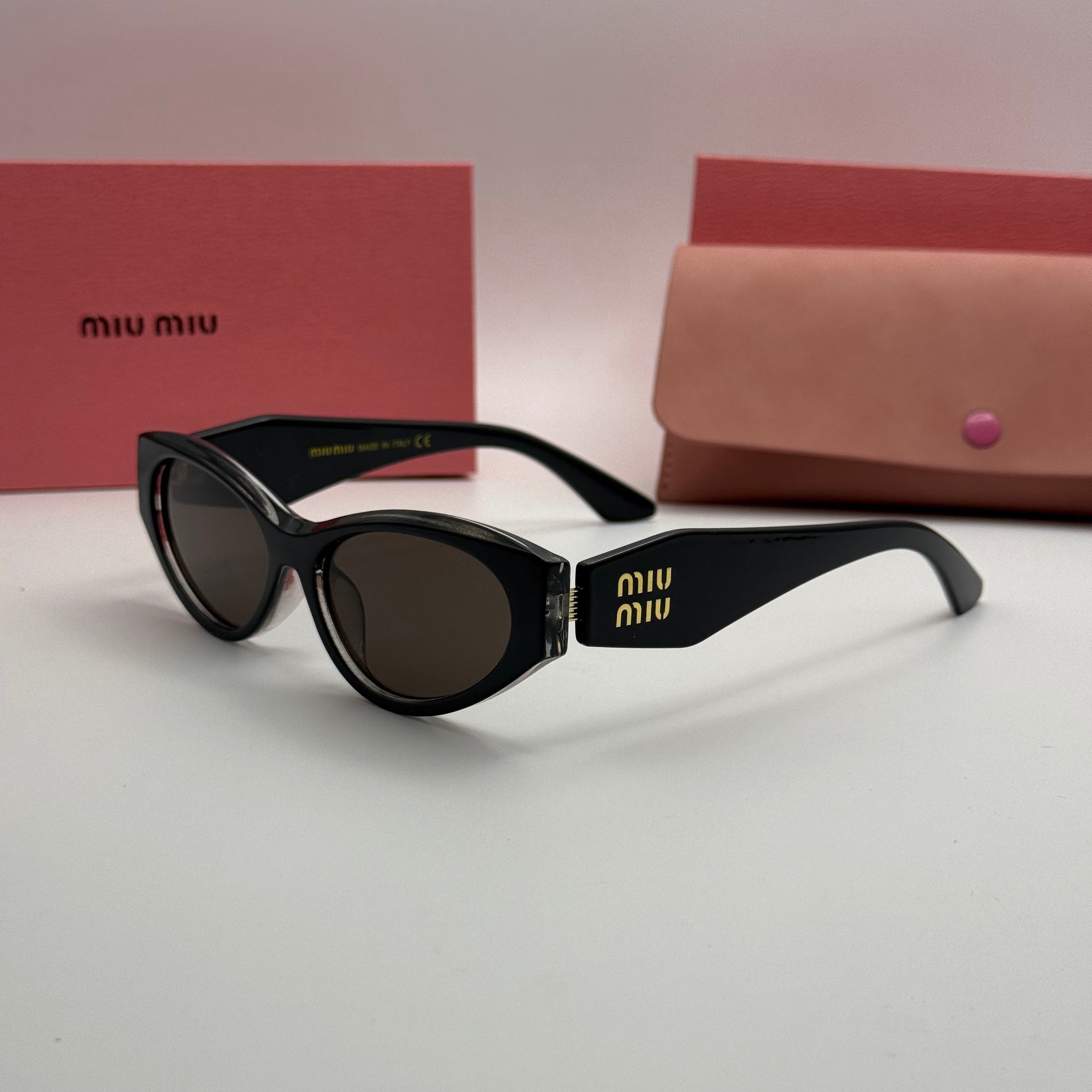 Miu Miu Oval Cat-Eye Sunglasses – Black & Silver