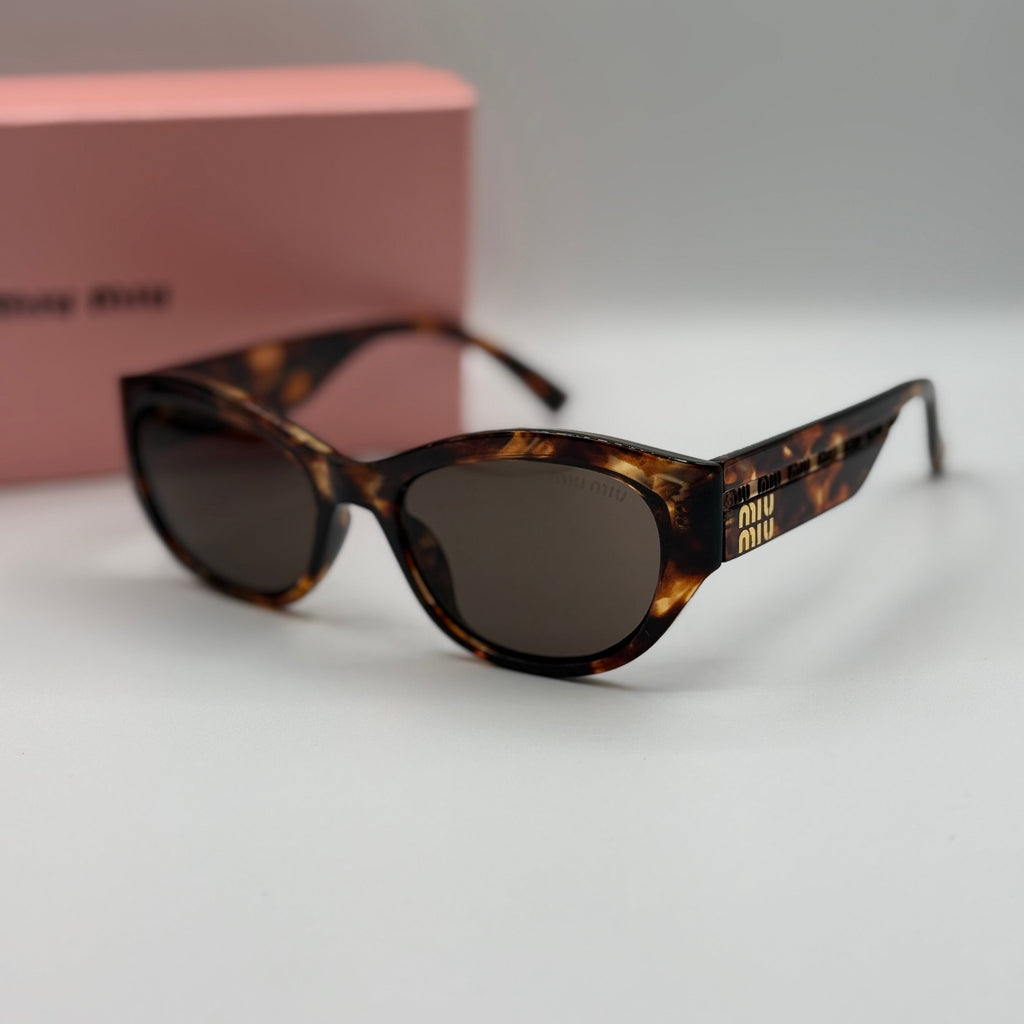 Miu Miu Cat-Eye Sunglasses – Tortoiseshell