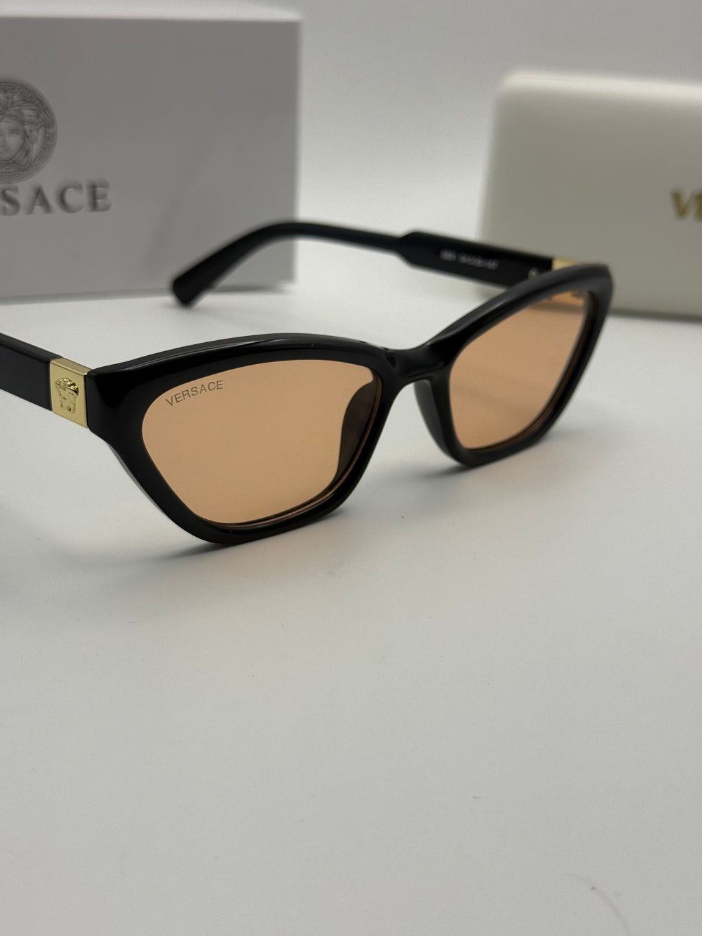 Versace Cat-Eye Sunglasses – Black / Amber Lenses