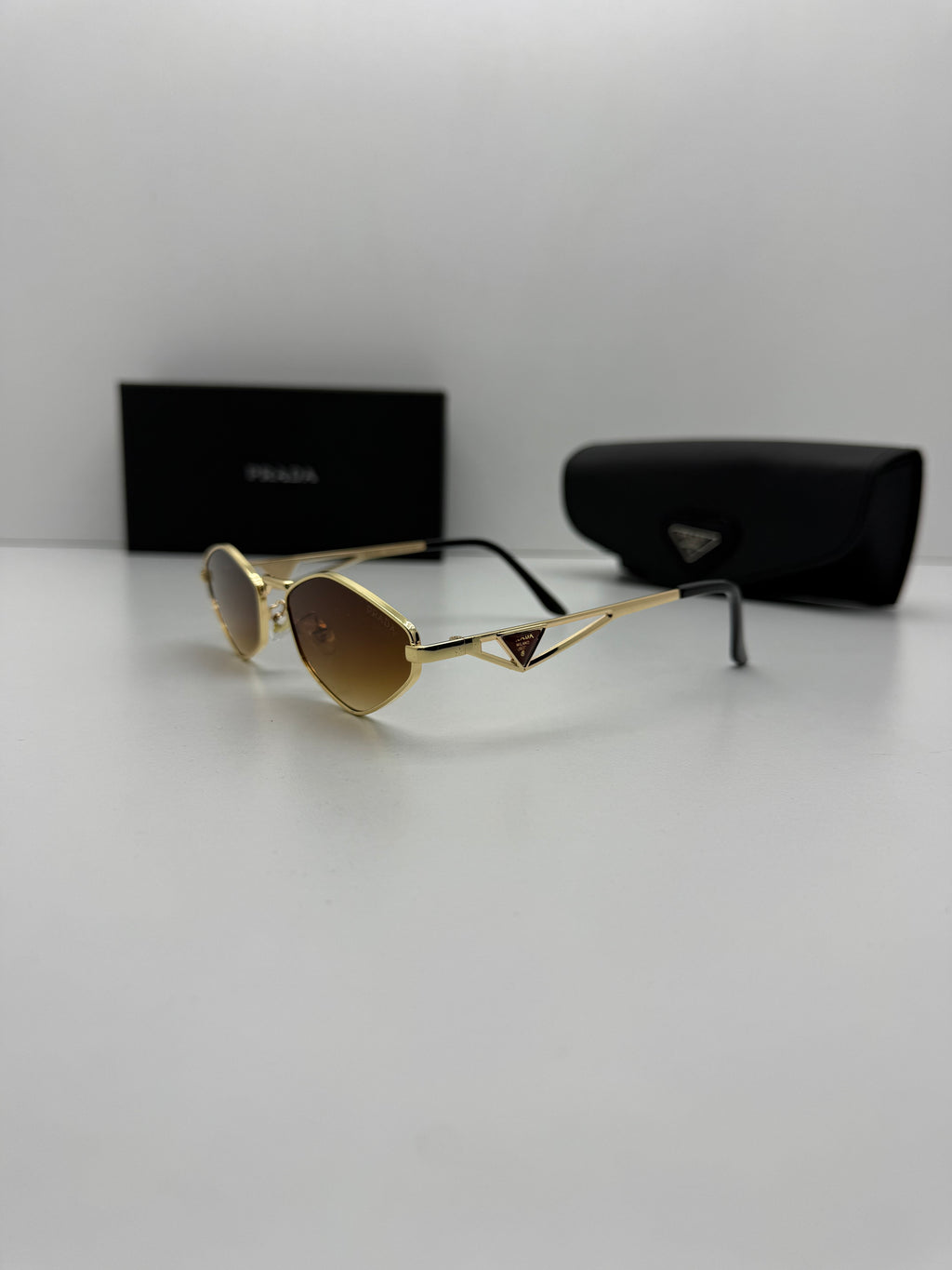Prada Gold Brown Sunglasses