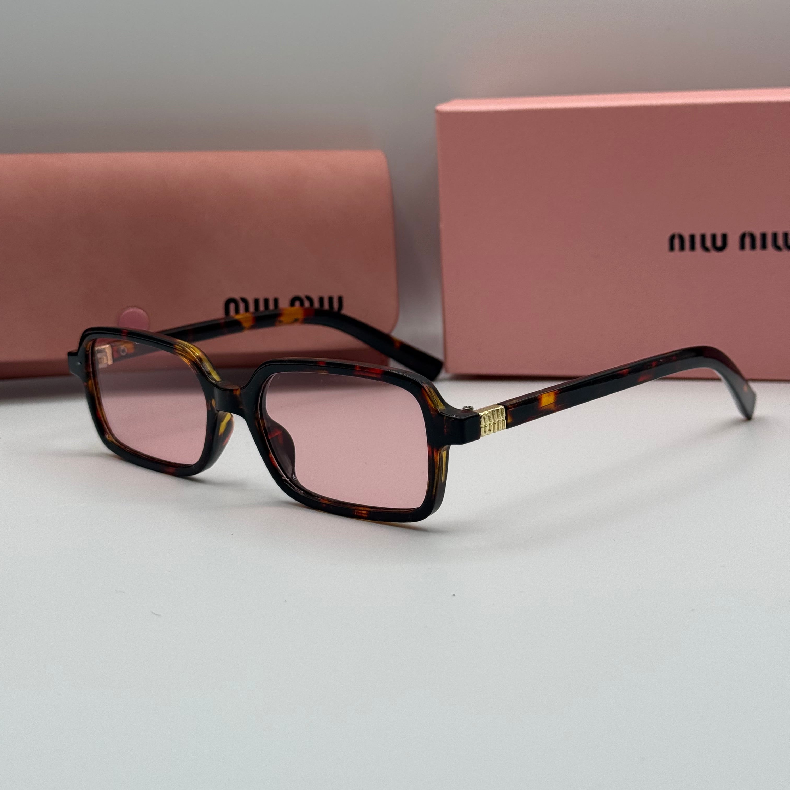 Miu Miu Sunglasses – Tortoise Shell Rectangle / Pink Lenses