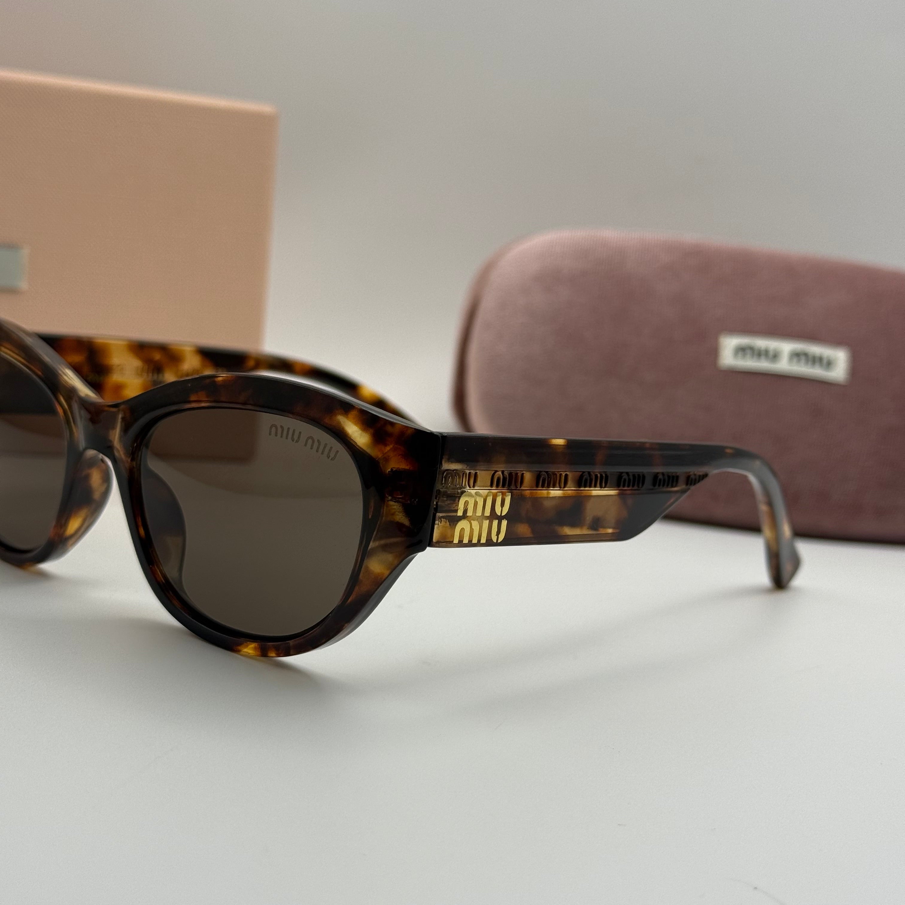 Miu Miu Cat-Eye Sunglasses – Tortoiseshell