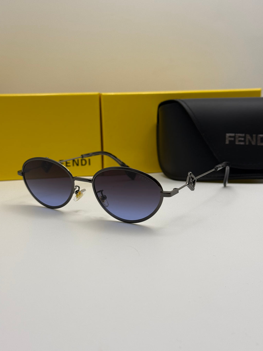 Fendi Round Sunglasses – Black Frame & Gradient Blue Lenses