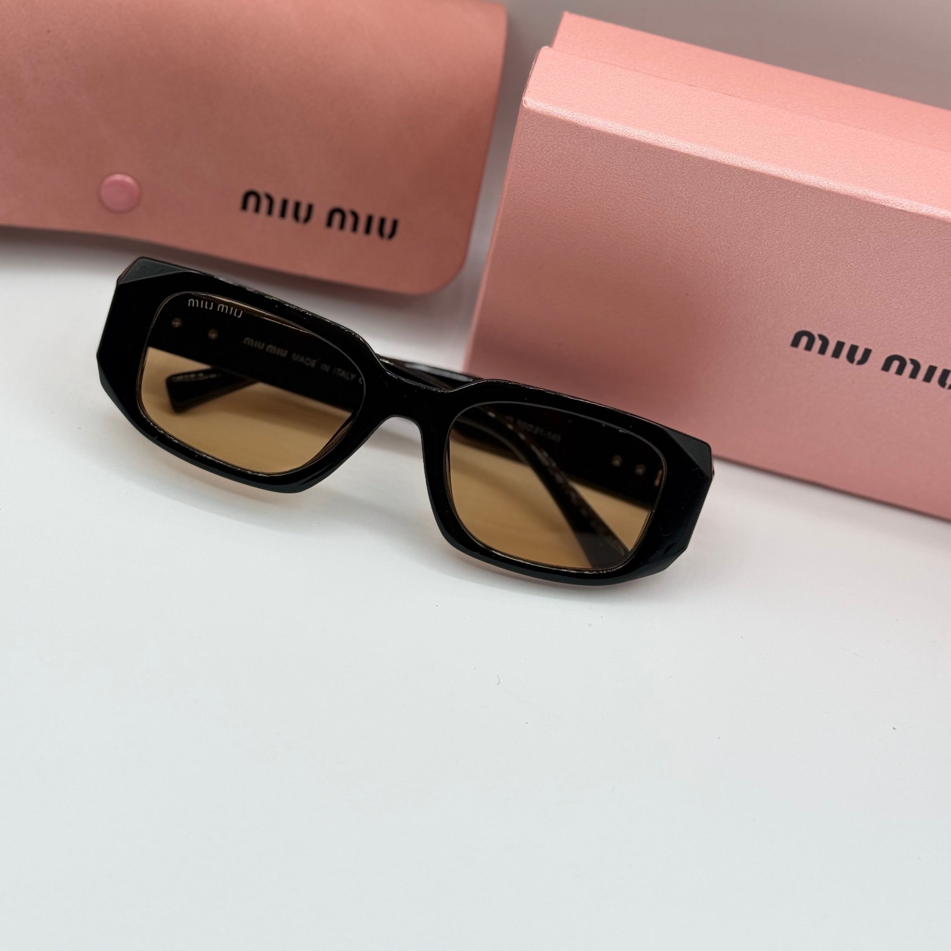 Miu Miu Rectangle Sunglasses - Black & Amber