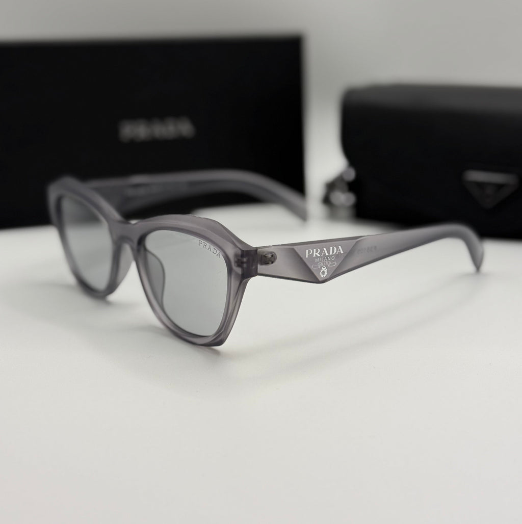 Prada Sunglasses – Grey Transparent Cat-Eye