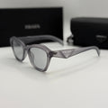 Prada Sunglasses – Grey Transparent Cat-Eye